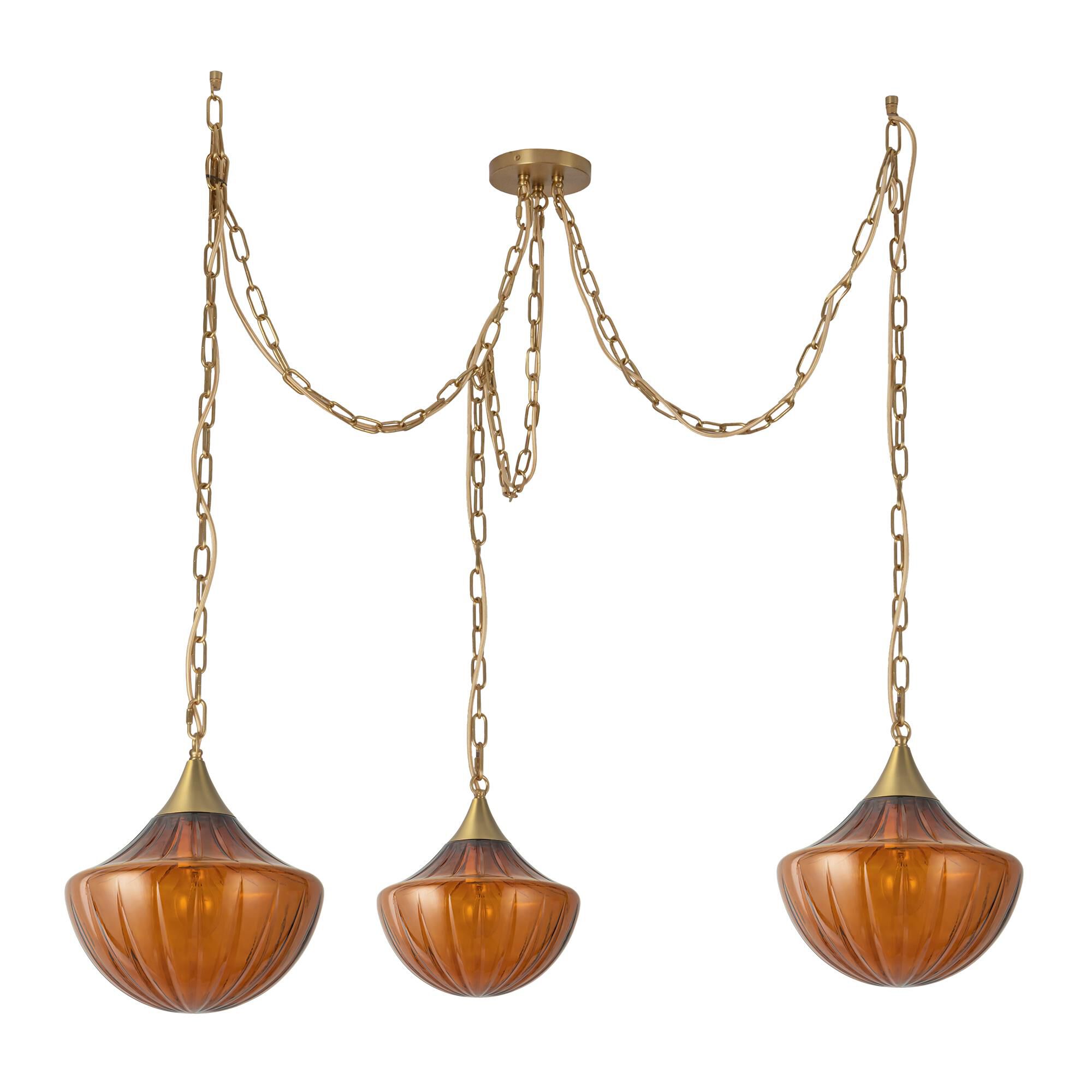 Shown in Brushed Gold finish and Amber Ribbed glass