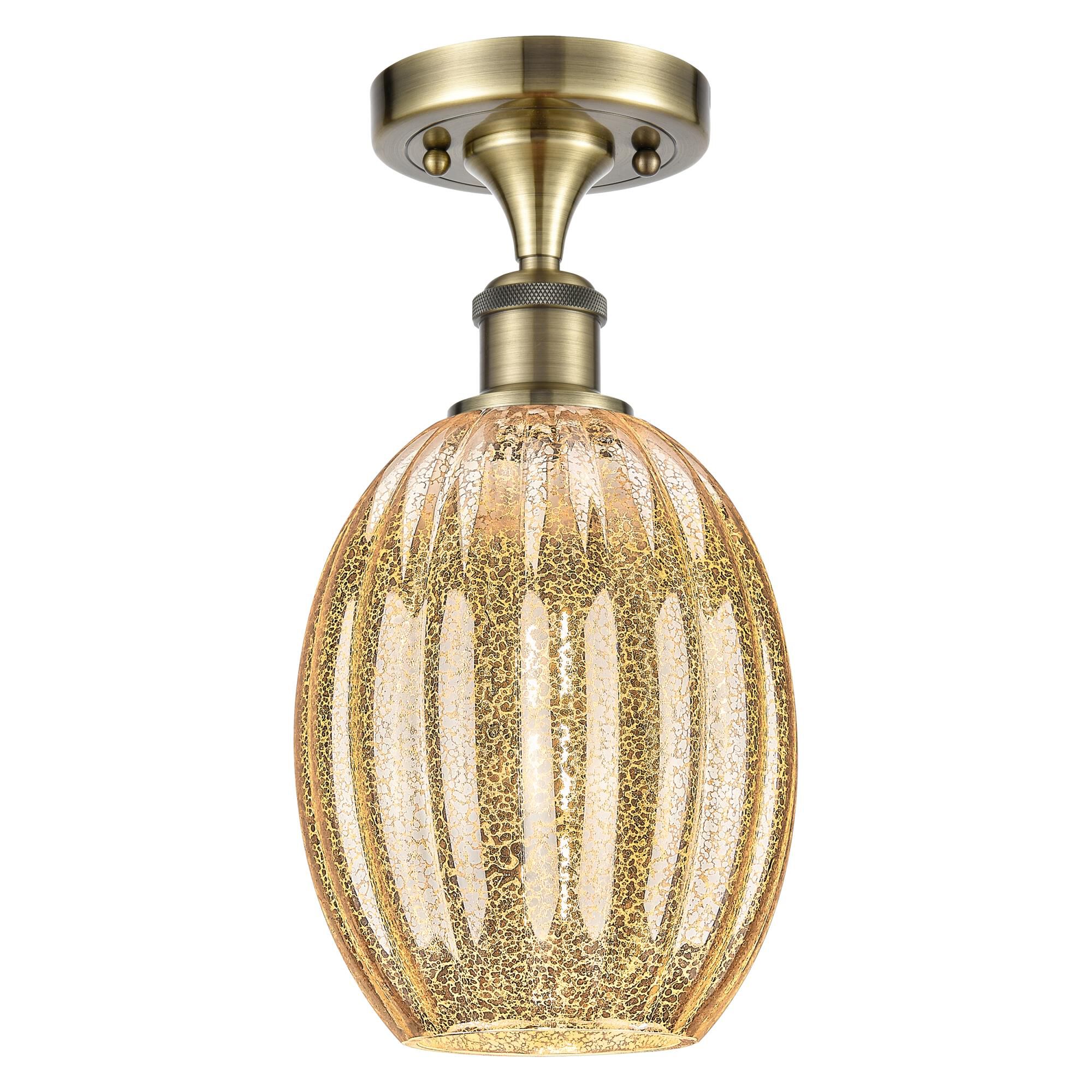 Shown in Antique Brass finish and Mercury glass