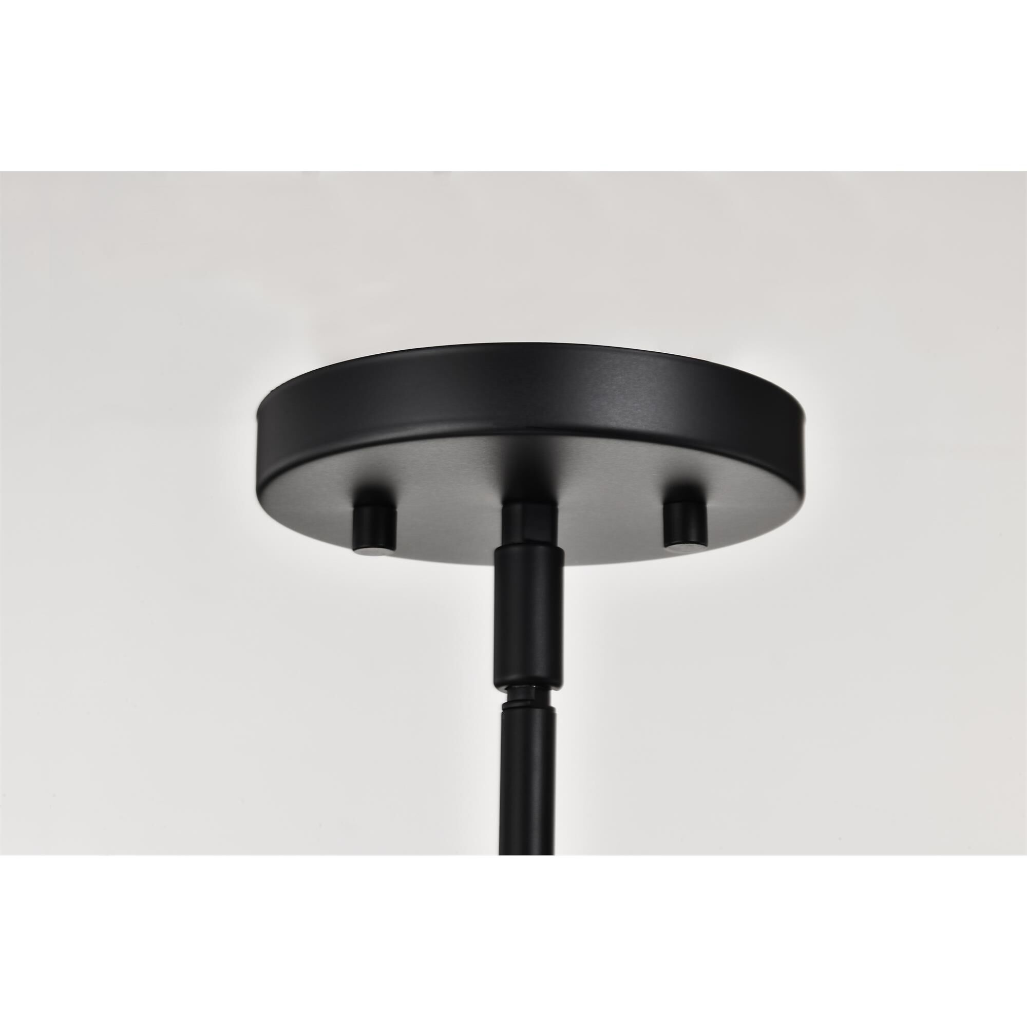 Shown in Matte Black finish and Clear Ribbed glass