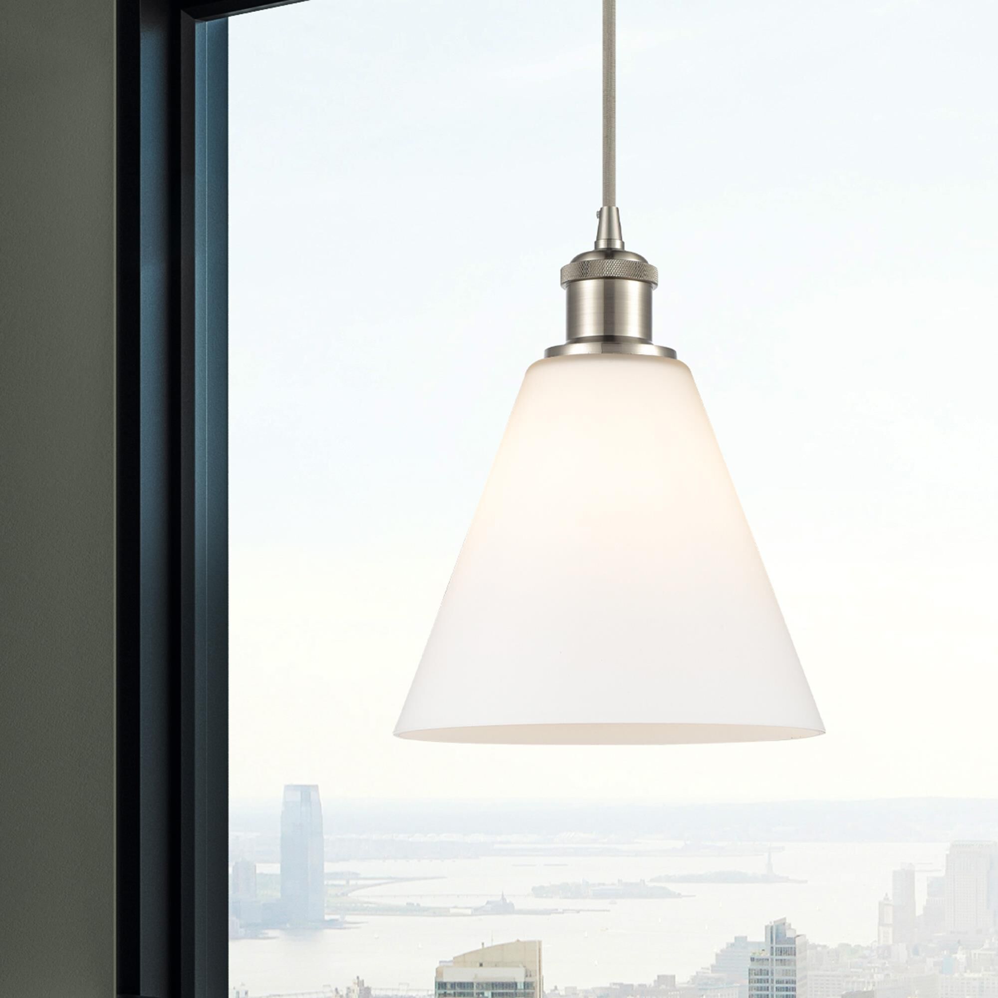 Shown in Brushed Satin Nickel finish and Matte White glass