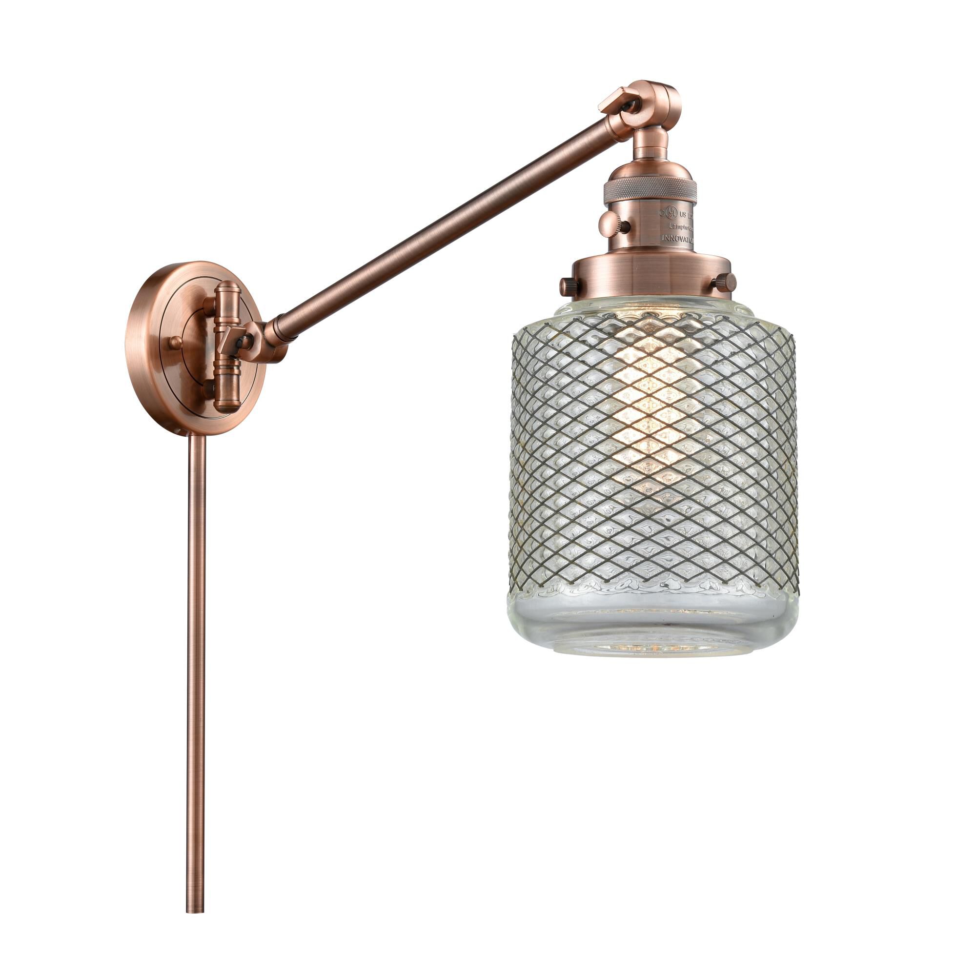 Shown in Antique Copper finish and Clear Wire Mesh glass