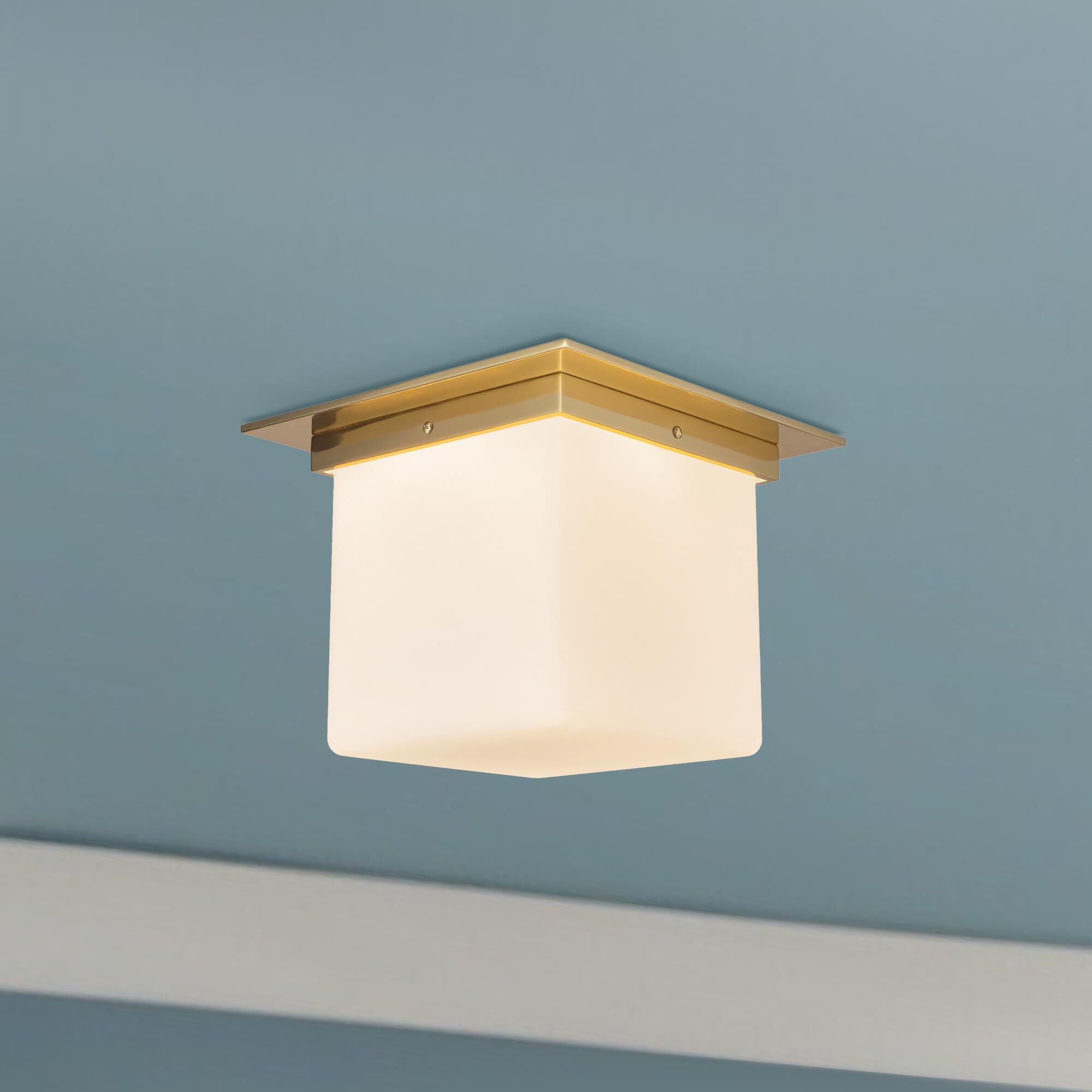 Shown in Patina Brass finish and Matte Opal glass