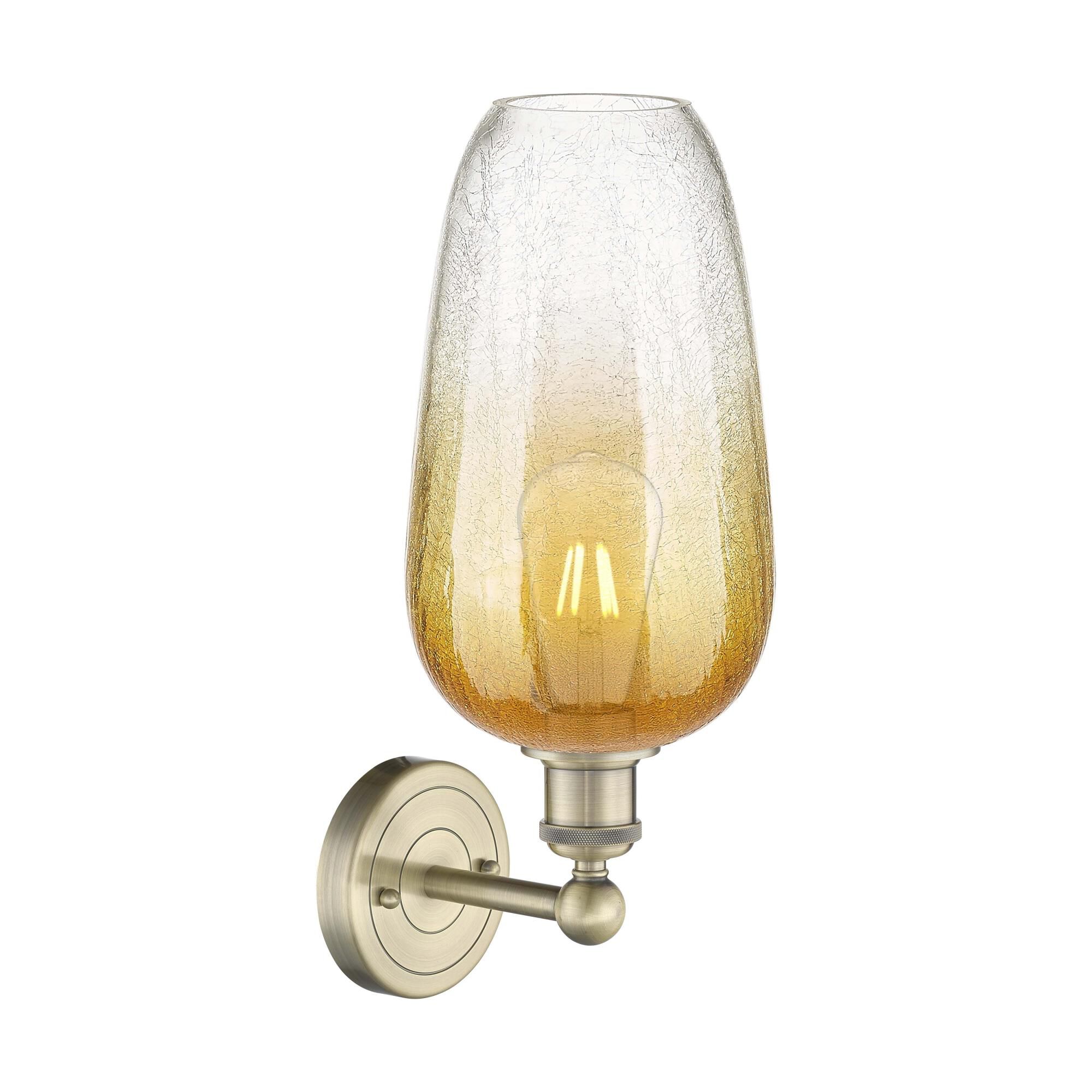 Shown in Antique Brass finish and Amber glass