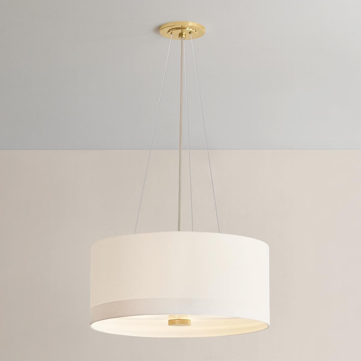 Shown in Aged Brass finish and White Linen shade