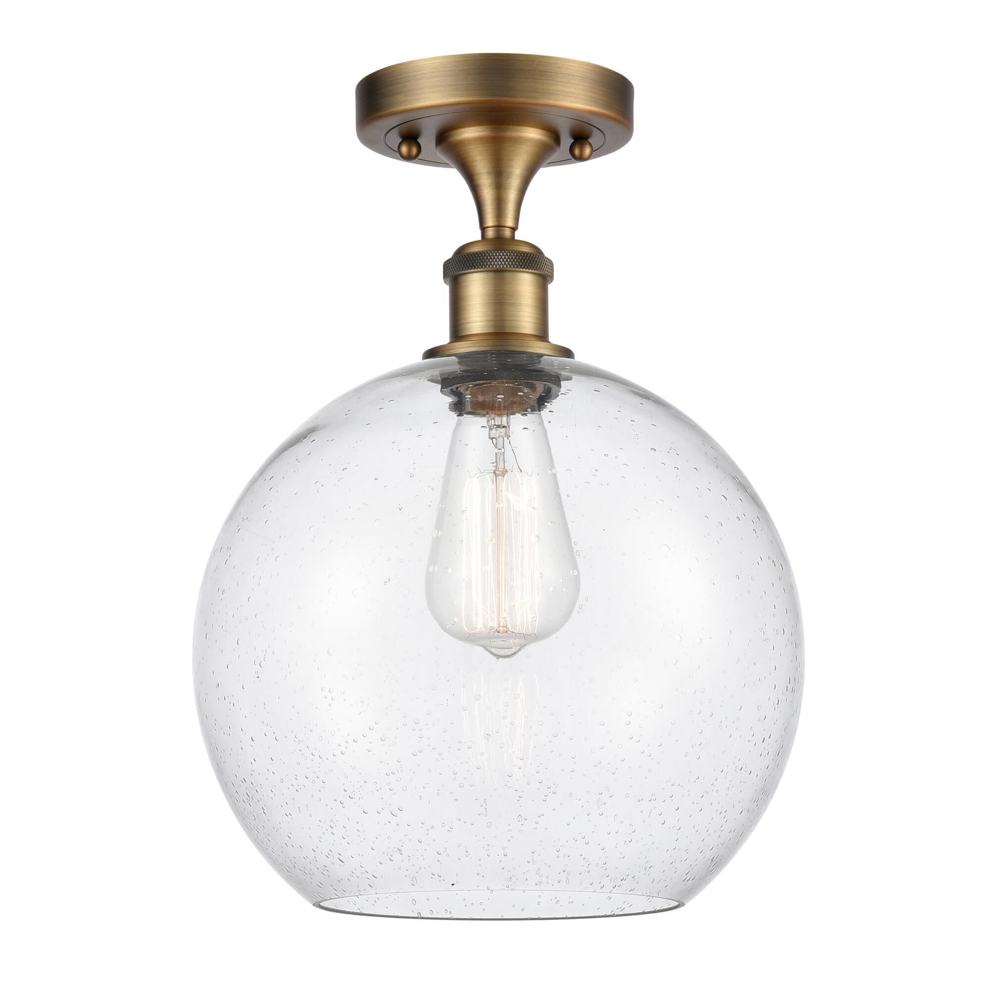Shown in Brushed Brass finish and Sphere glass and Glass shade