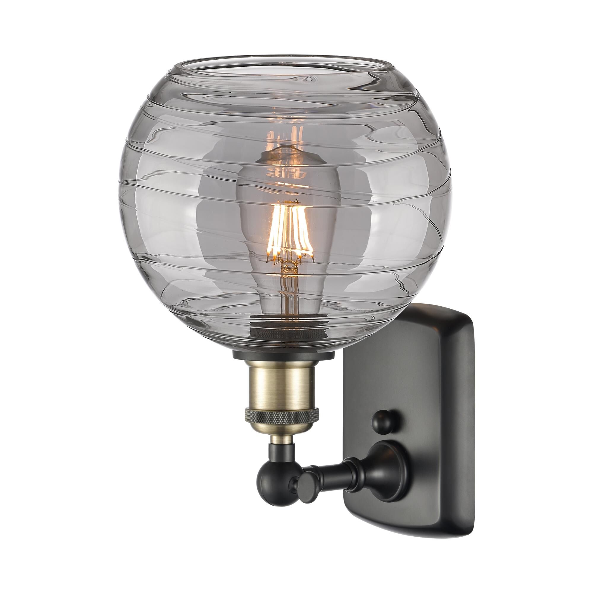 Shown in Black Antique Brass finish and Light Smoke Deco Swirl glass