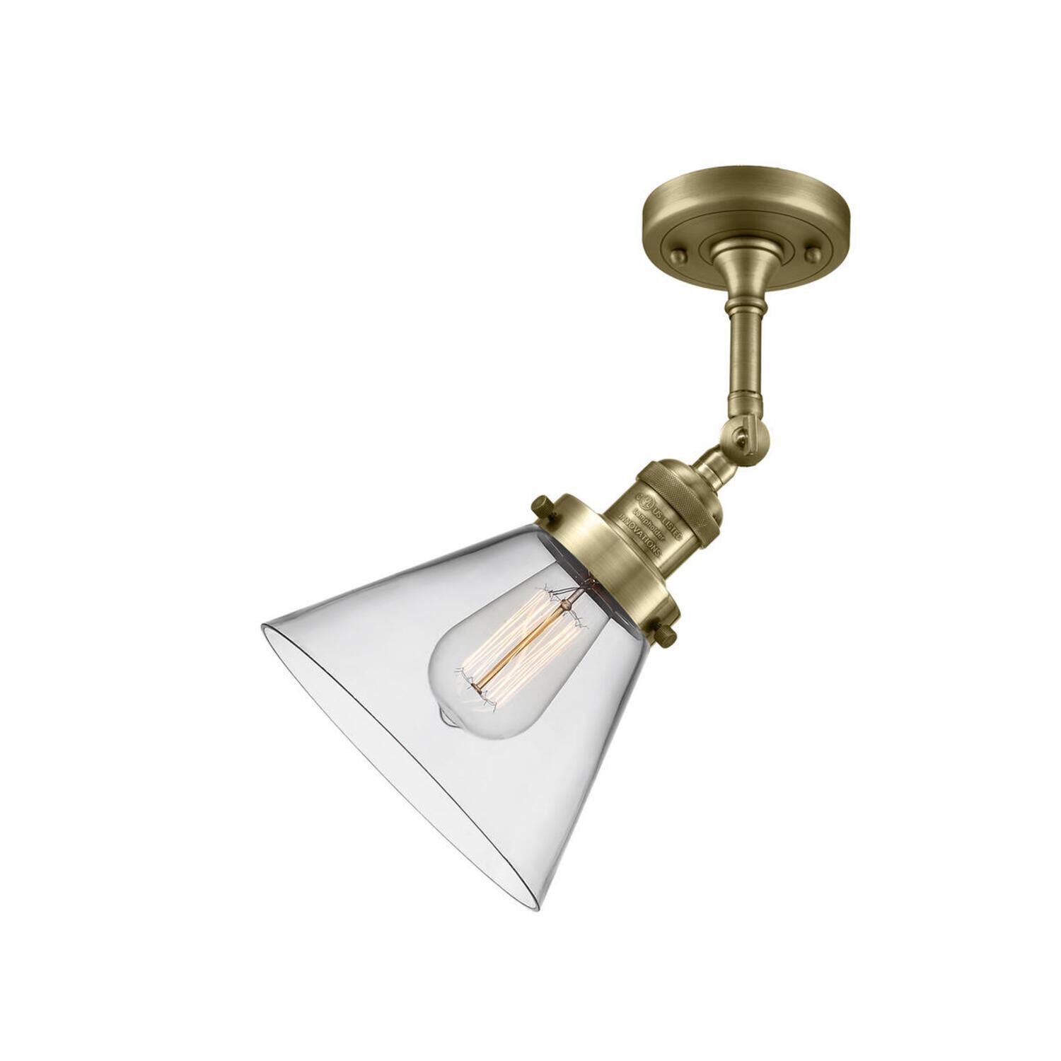 Shown in Antique Brass finish and Clear glass and None accent