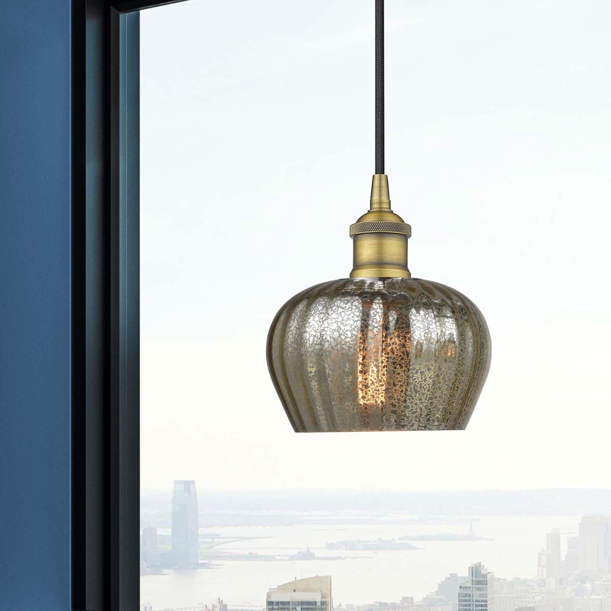 Shown in Brushed Brass finish and Mercury Fenton glass