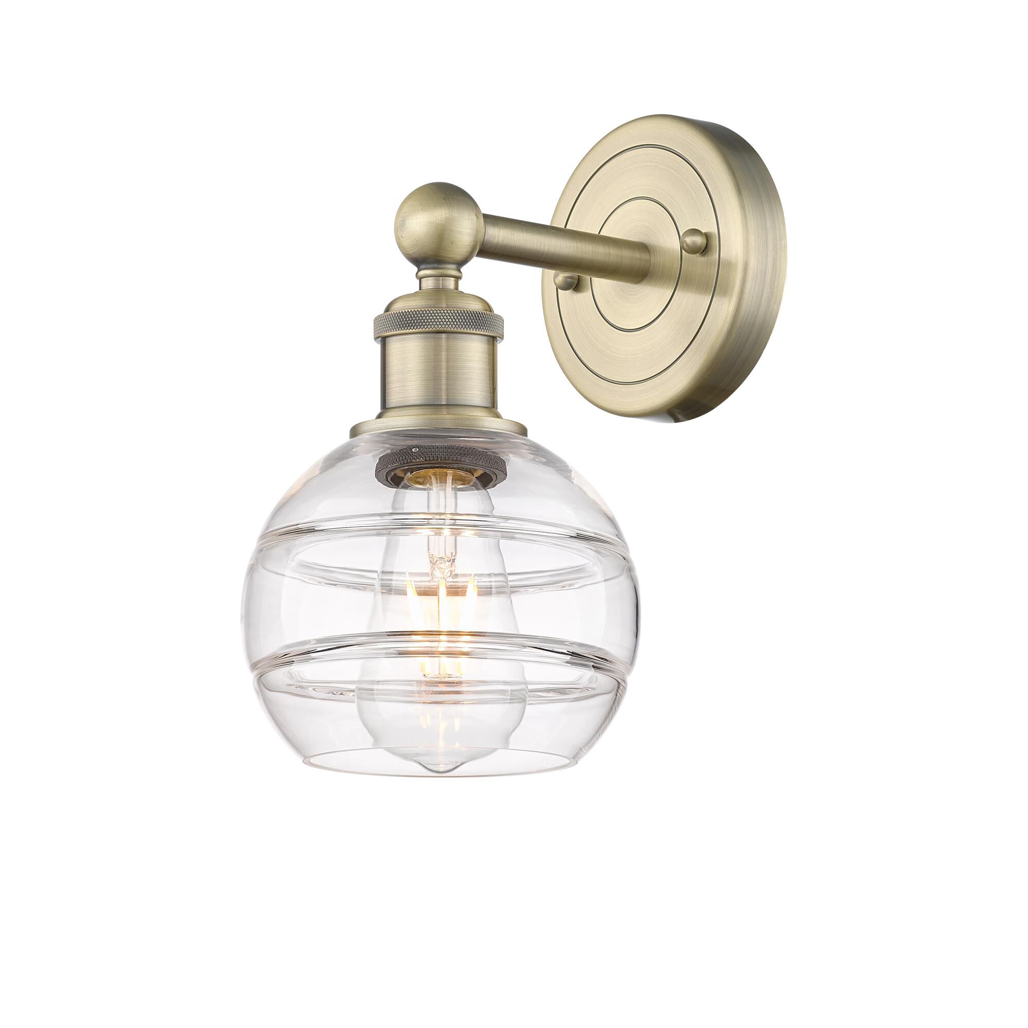 Shown in Antique Brass finish and Clear glass