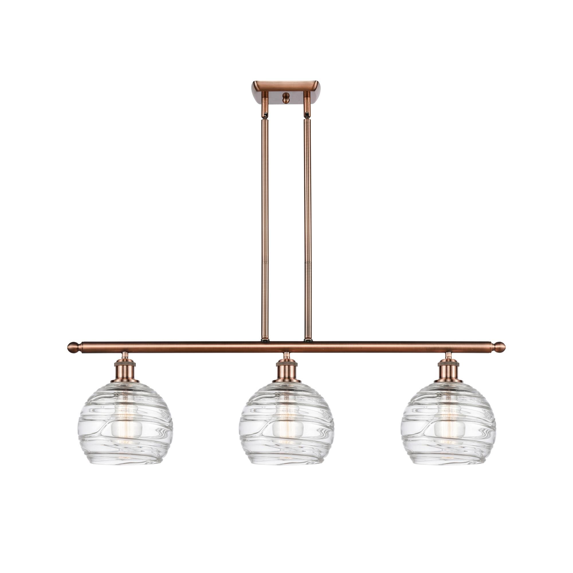 Shown in Antique Copper finish and Sphere glass and Glass shade