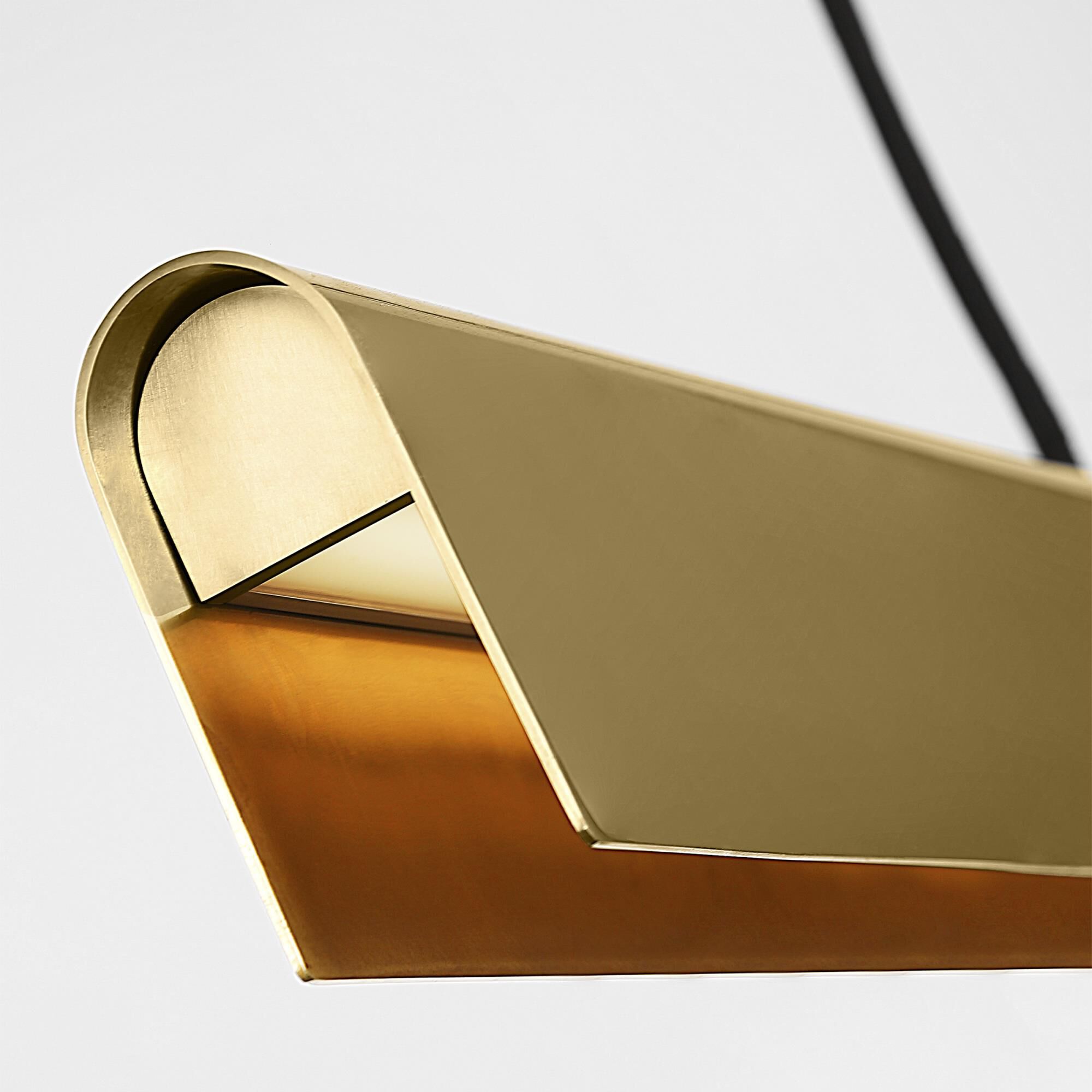 Shown in Hand-Rubbed Antique Brass finish and Brass shade