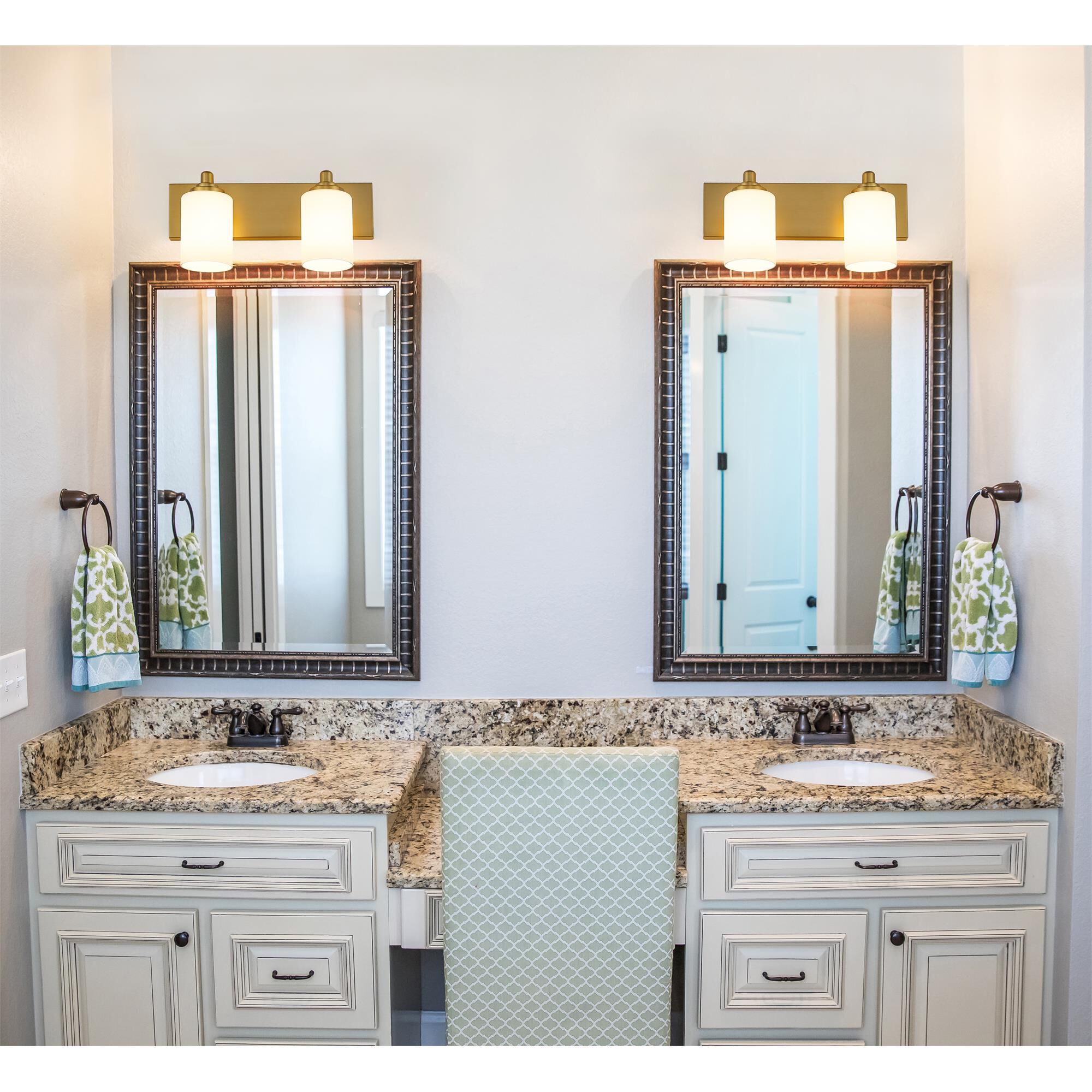 Shown in Brushed Gold finish and White glass
