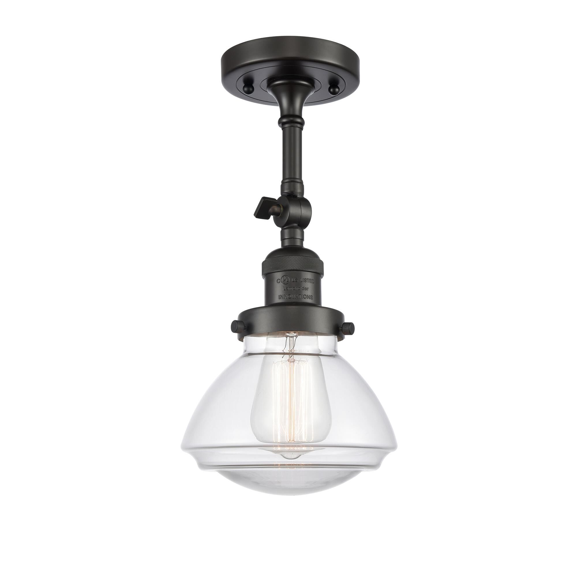Shown in Oil Rubbed Bronze finish and Transparent  Clear Olean glass and Glass shade and Bulb Tint - Amber accent