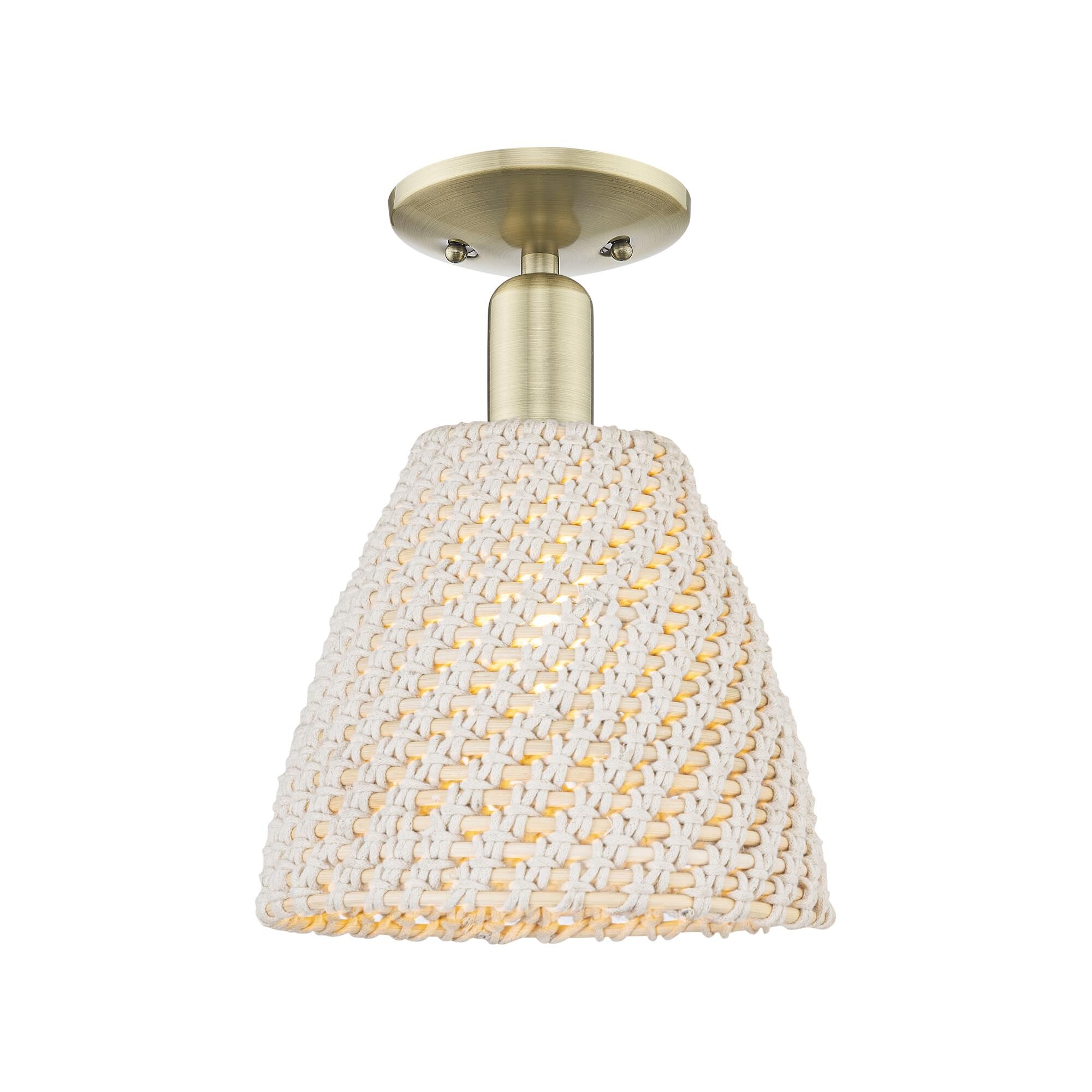 Shown in Antique Brass finish and Natural shade