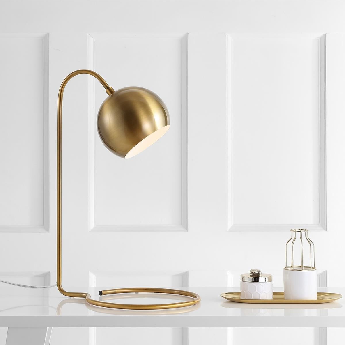 Shown in Brass Gold finish and Metal shade