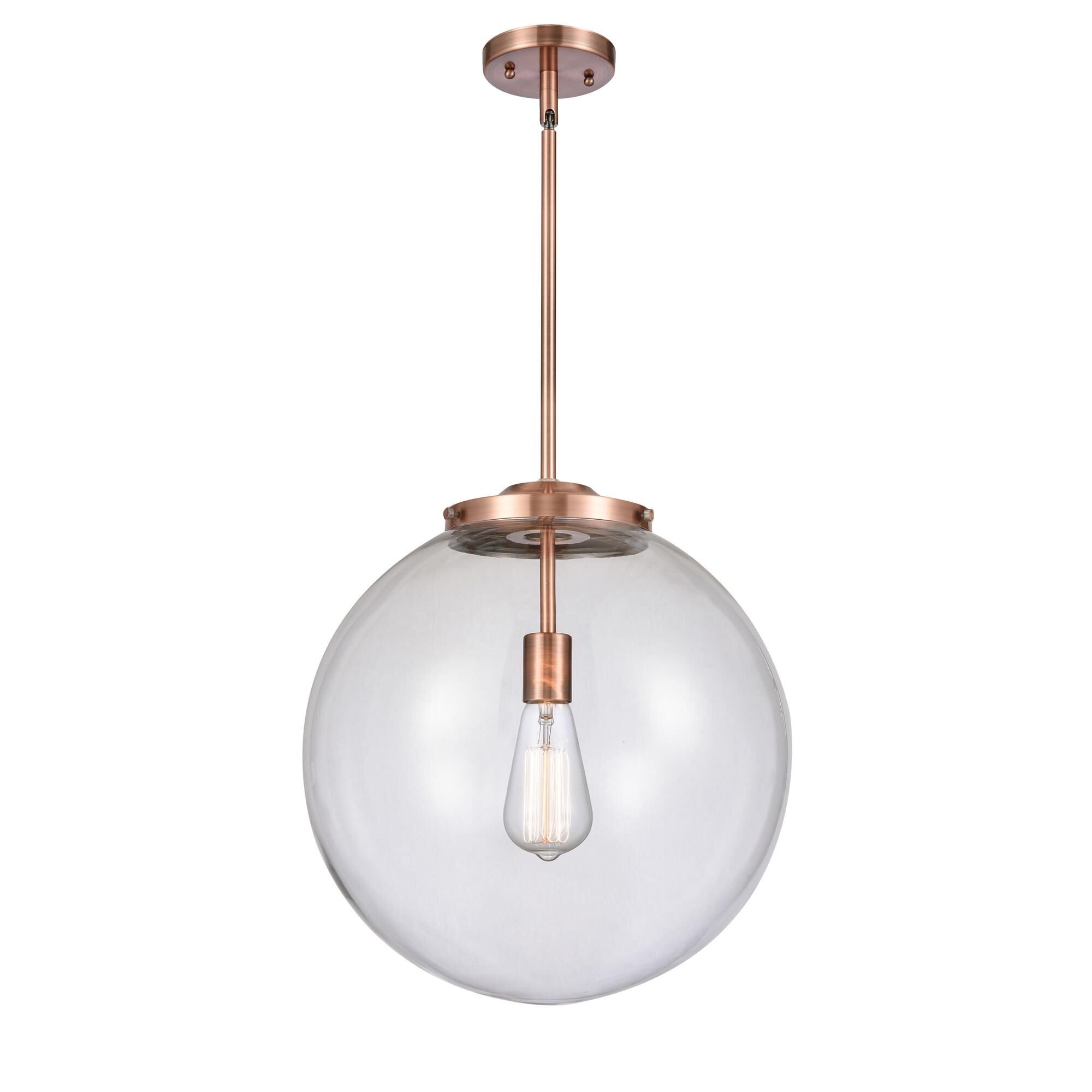 Shown in Antique Copper finish and Clear Beacon glass