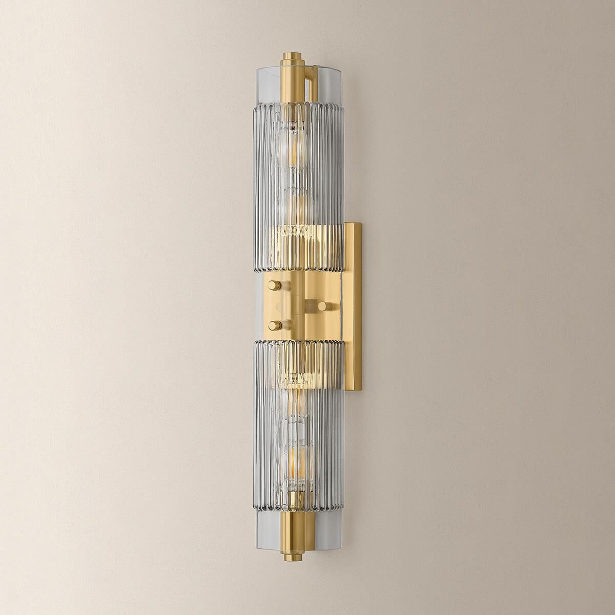Shown in Vintage Brass finish and Clear Smoke glass