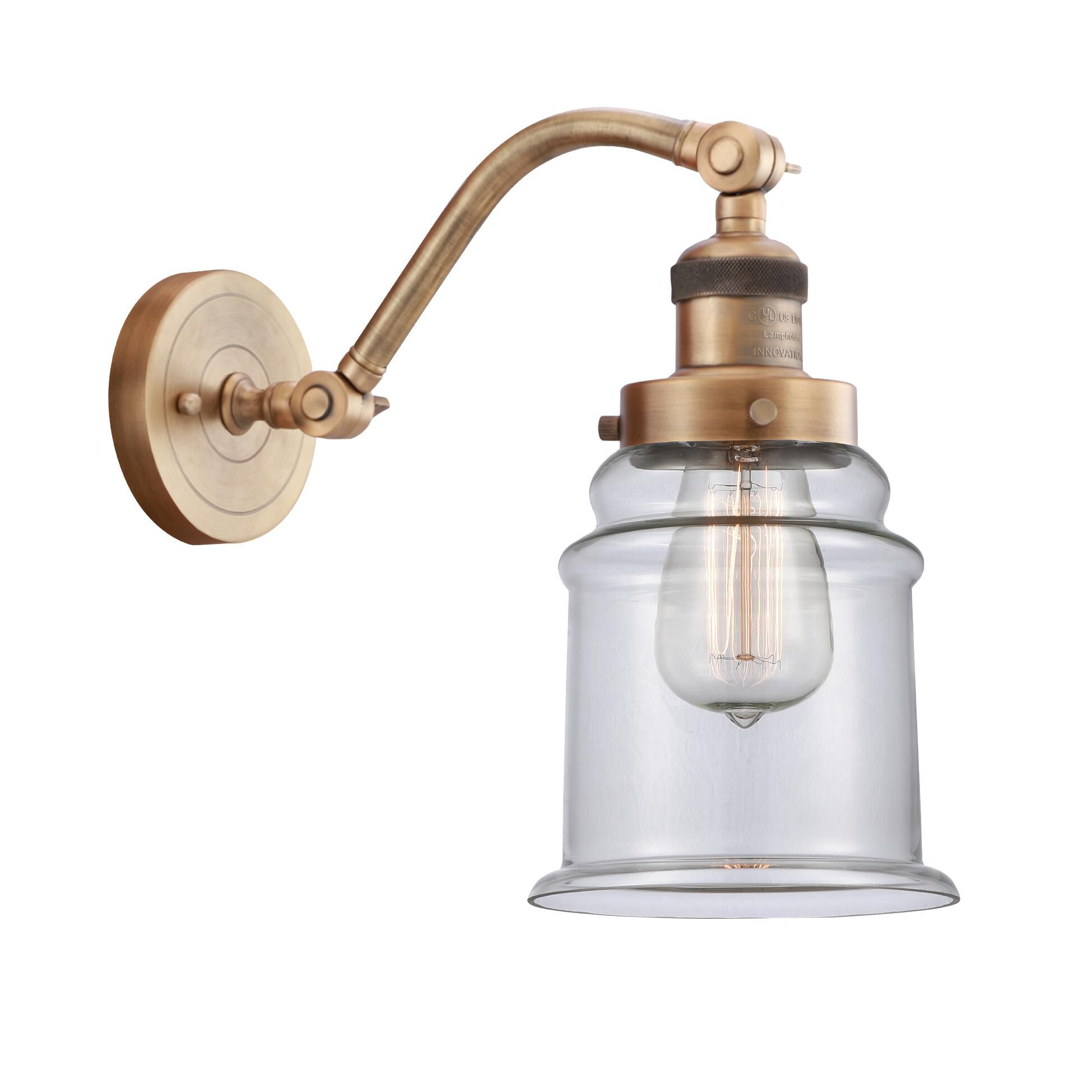 Shown in Brushed Brass finish and Clear Canton glass