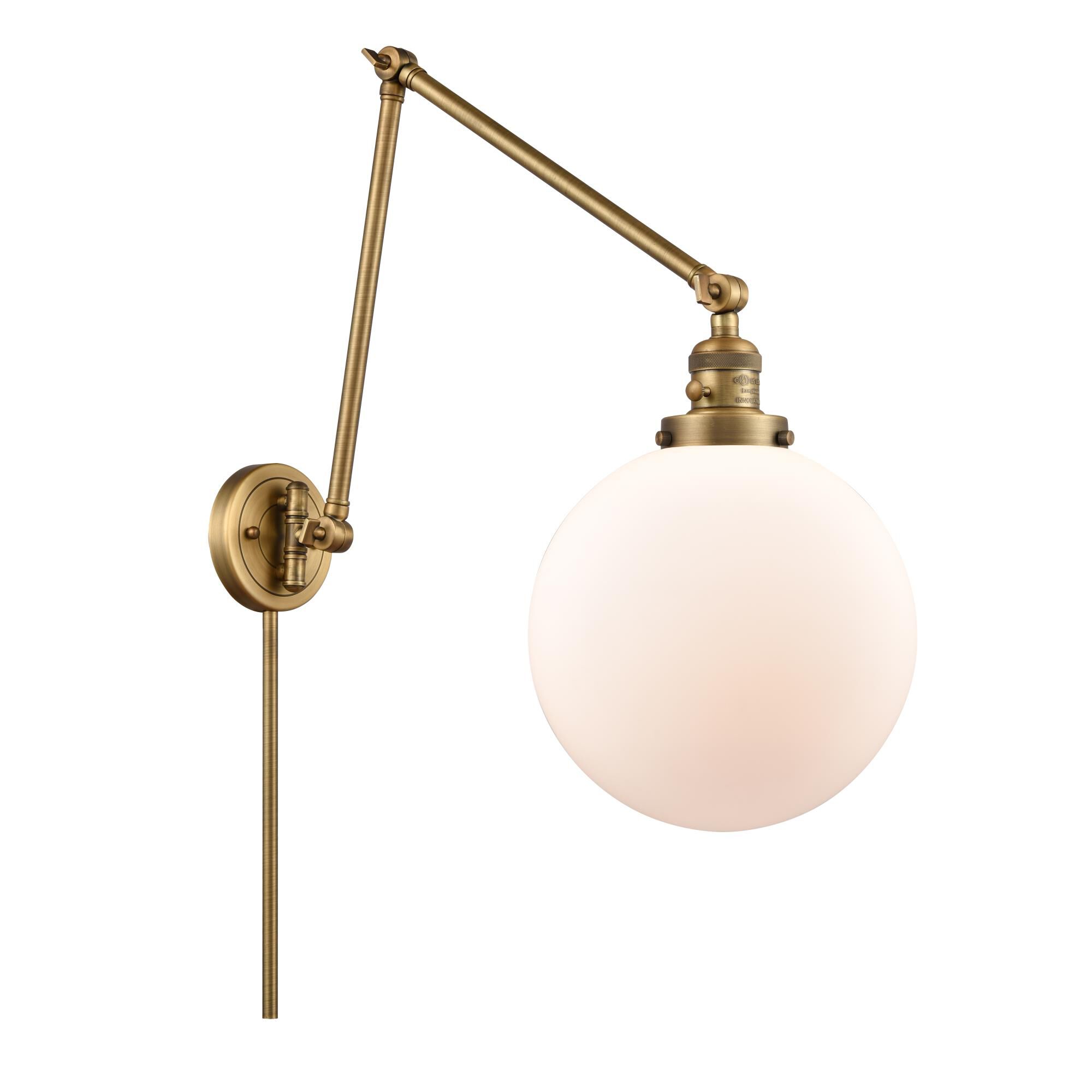 Shown in Brushed Brass finish and Matte White Cased Beacon glass