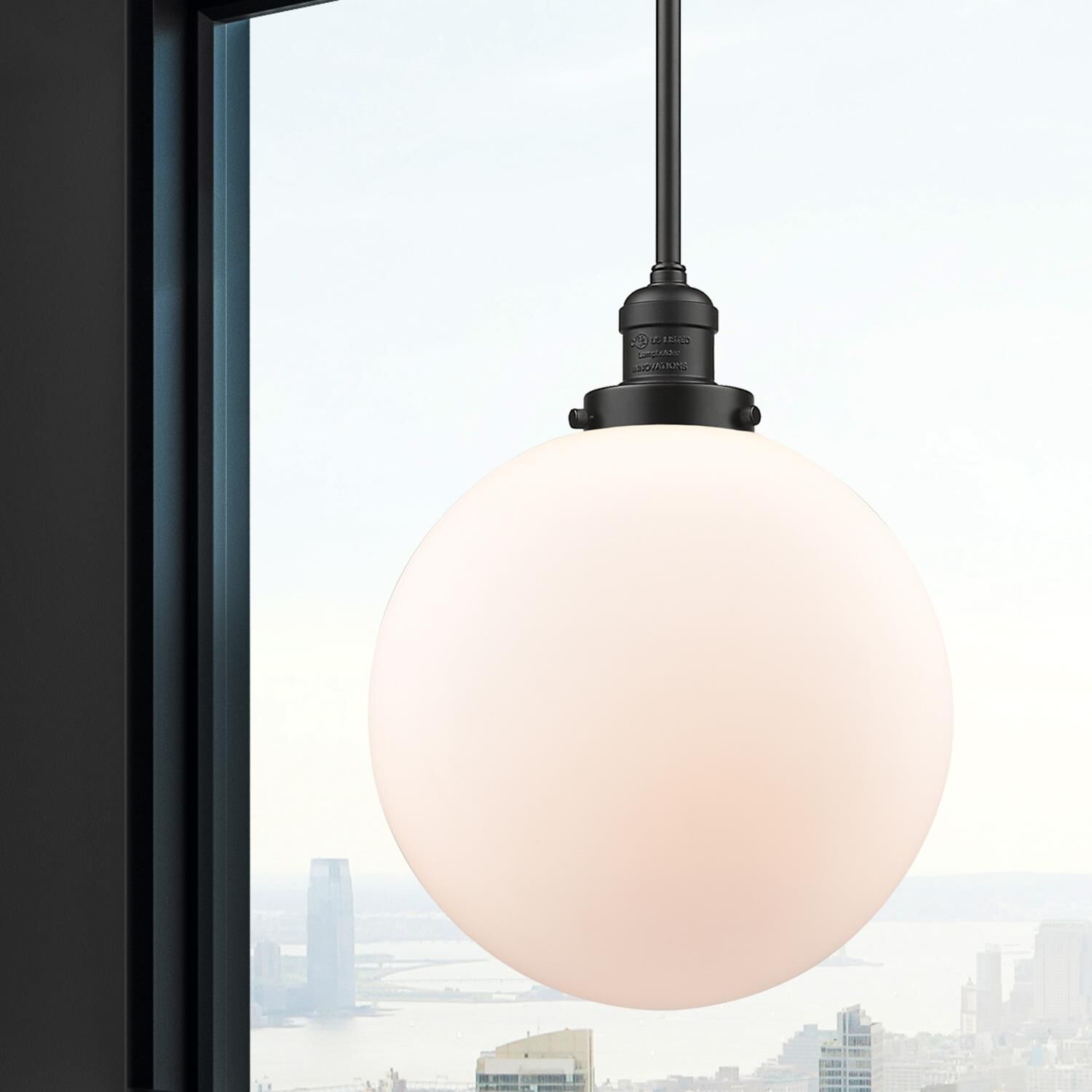 Shown in Oil Rubbed Bronze finish and Matte White Cased Beacon glass