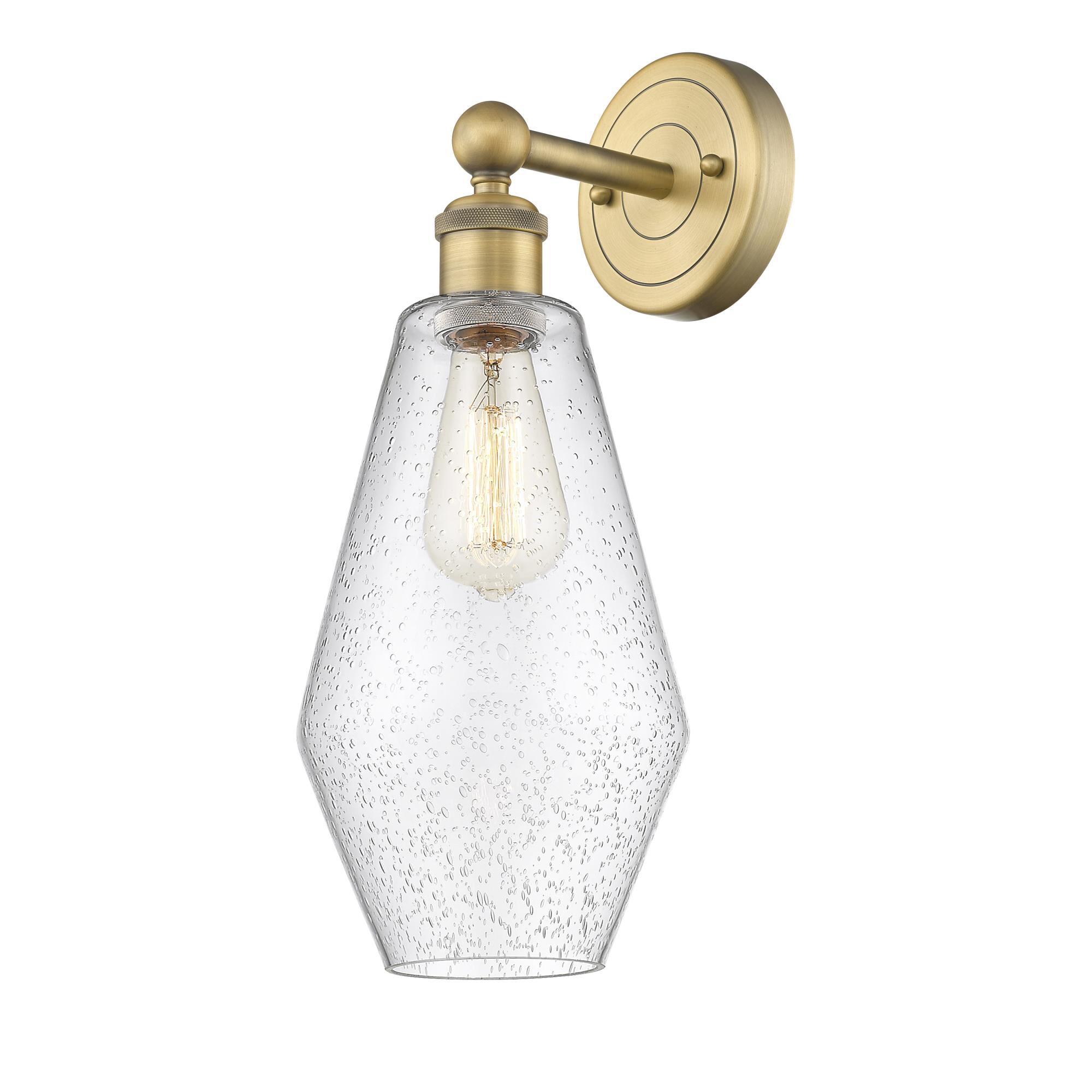 Shown in Brushed Brass finish and Seedy glass