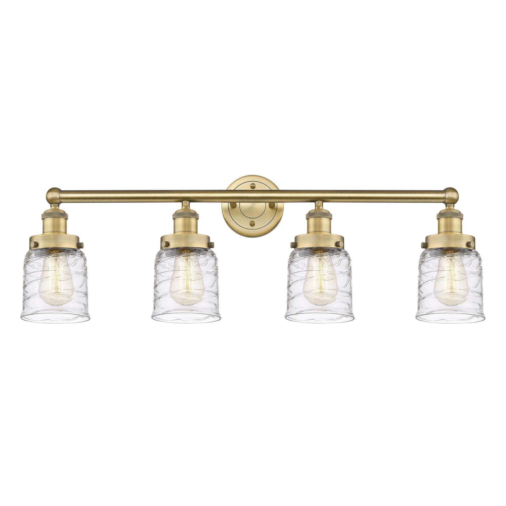 Shown in Brushed Brass finish and Clear Deco Swirl glass
