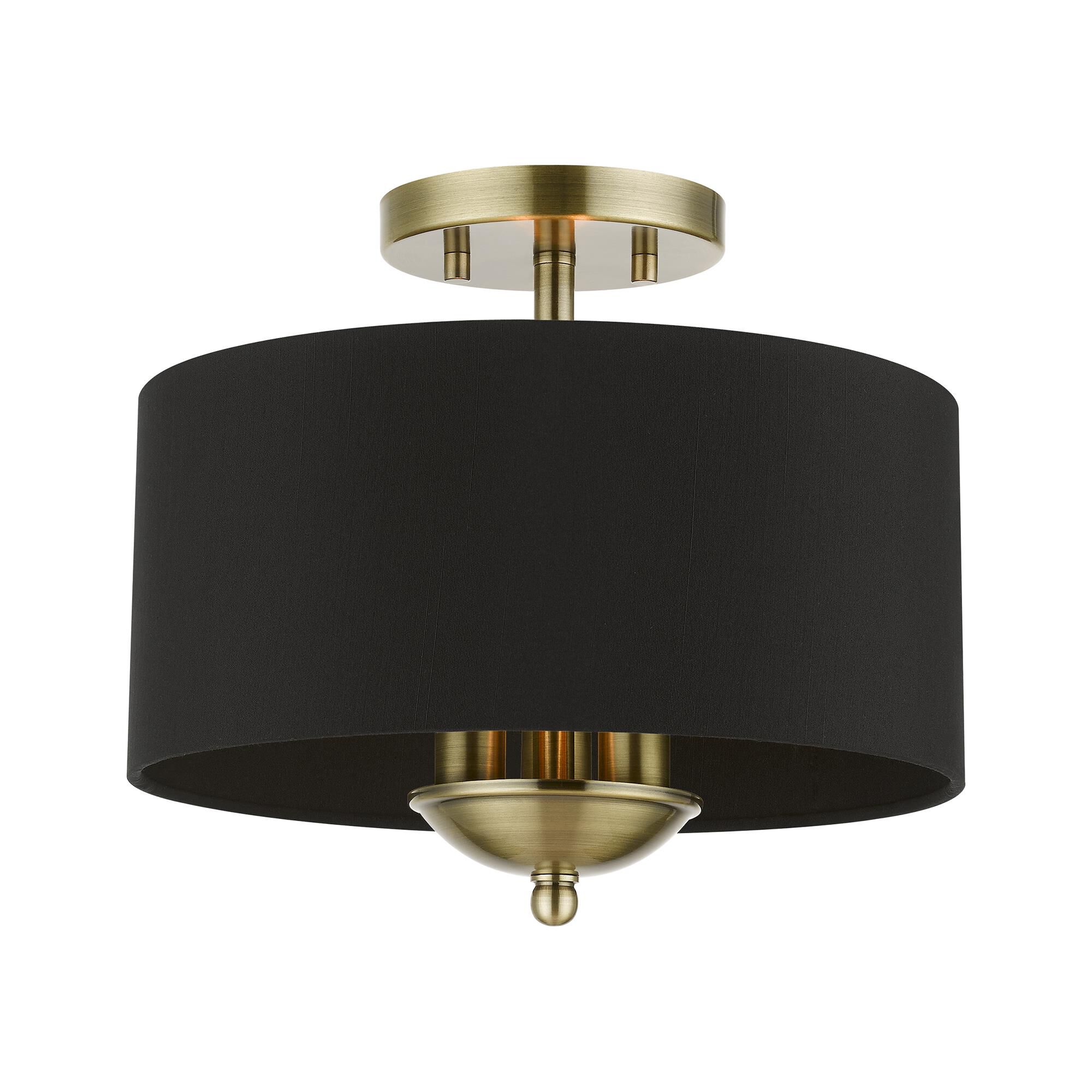 Shown in Antique Brass finish and Black Fabric Hardback shade