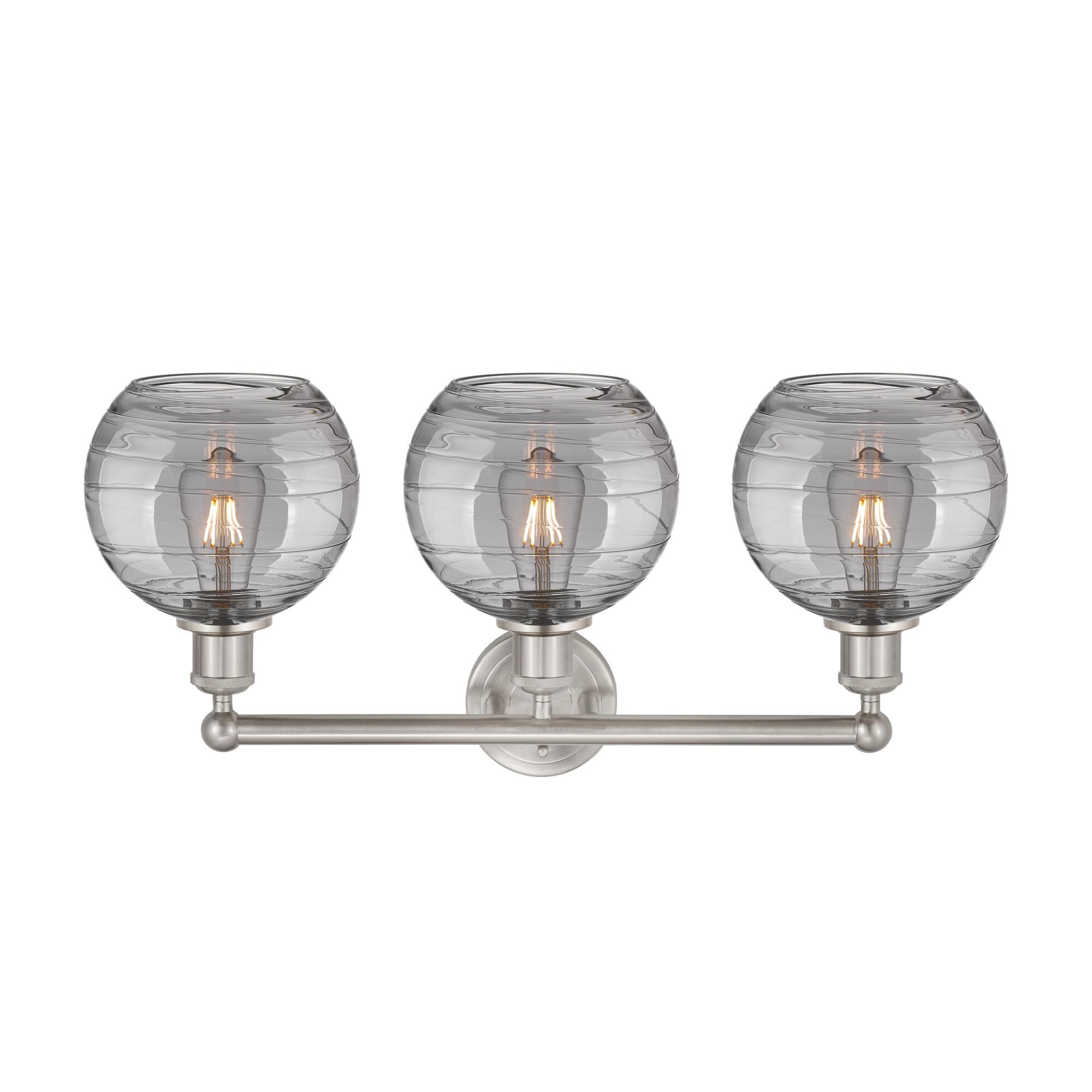 Shown in Satin Nickel finish and Light Smoke Deco Swirl glass