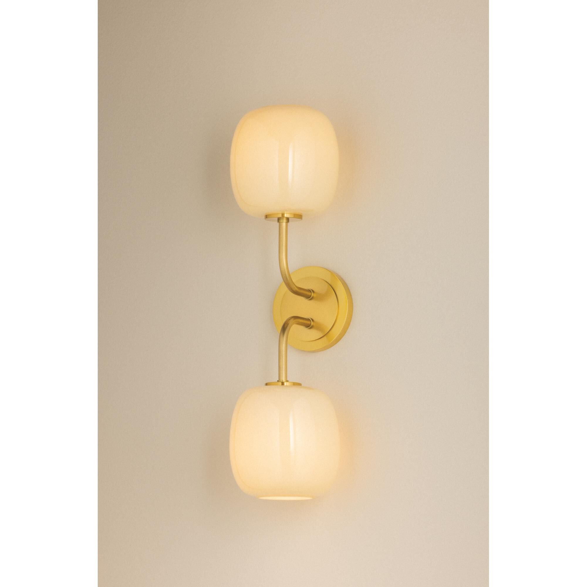 Shown in Aged Brass finish and Cream Opal glass