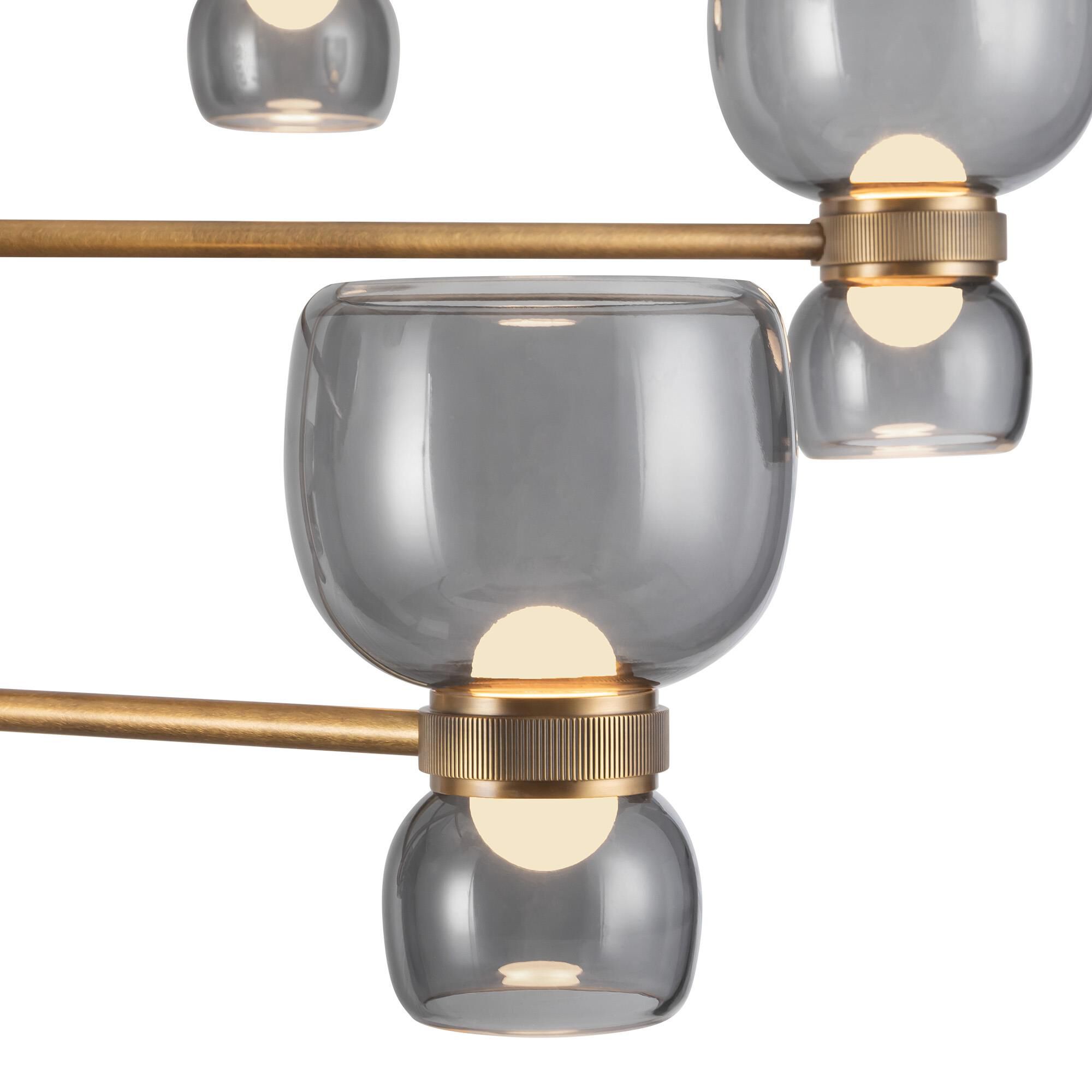 Shown in Vintage Brass finish and Smoked glass