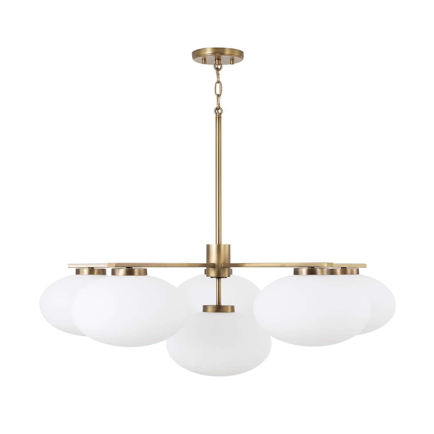 Shown in Aged Brass finish and Soft White glass