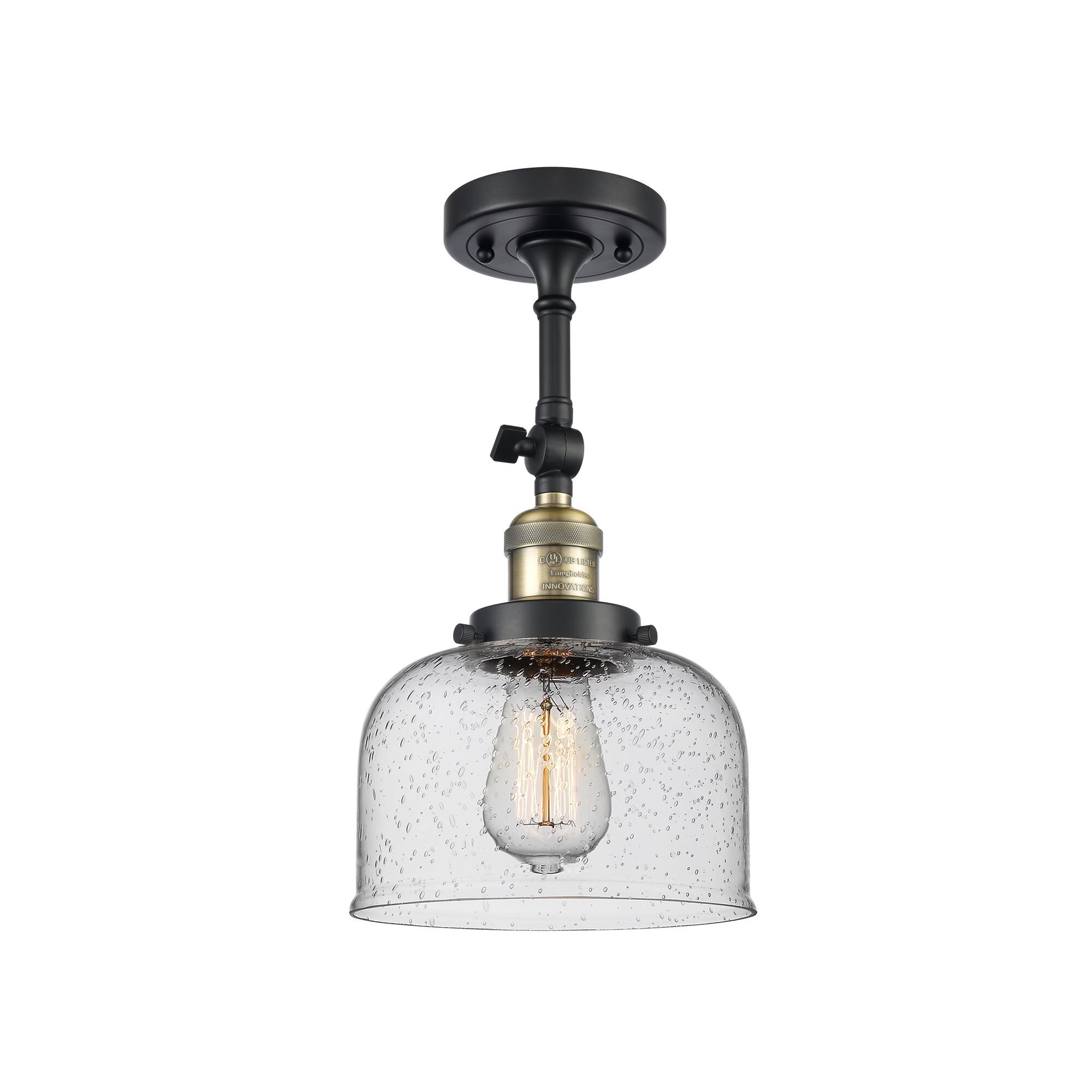 Shown in Black Antique Brass finish and Seedy glass