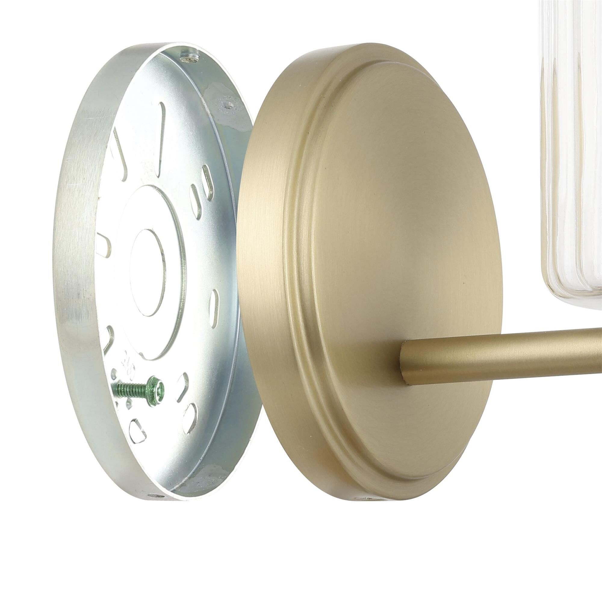 Shown in Champagne Gold finish and Clear Ribbed glass
