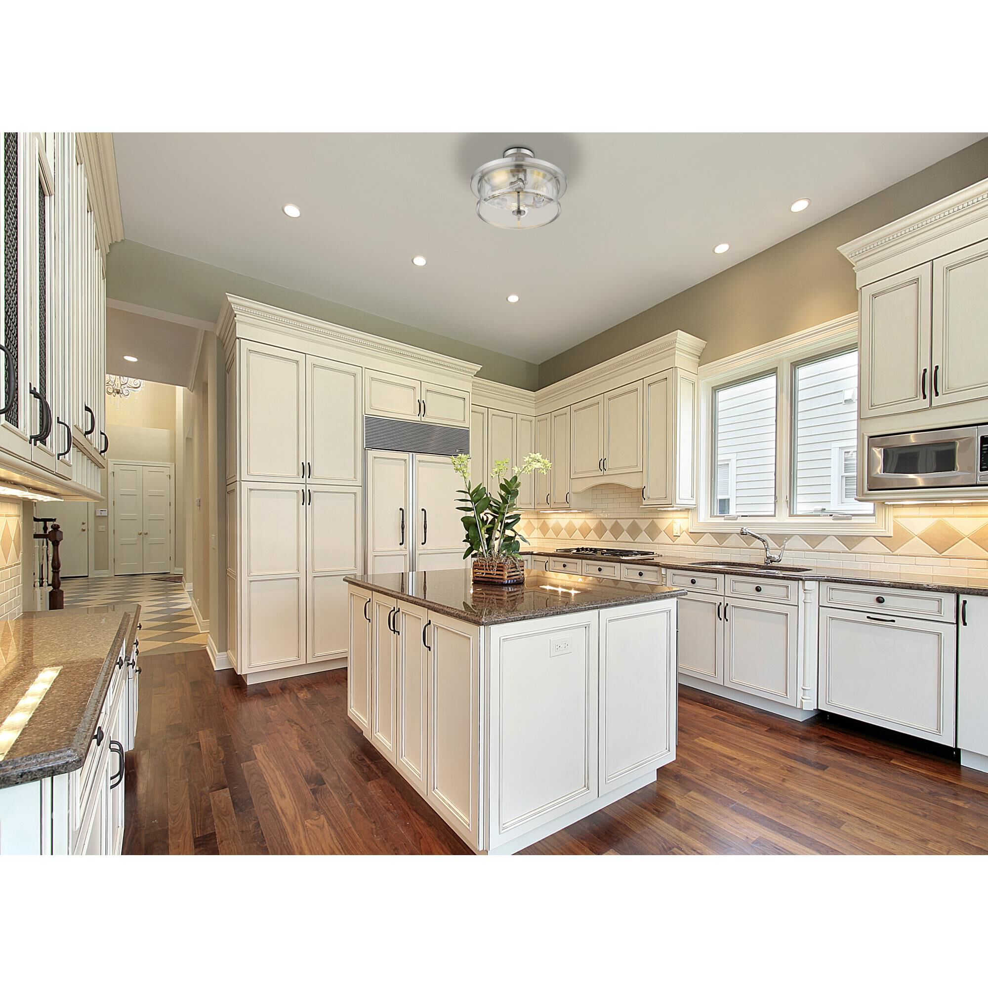 Shown in Brushed Nickel finish and Glass shade