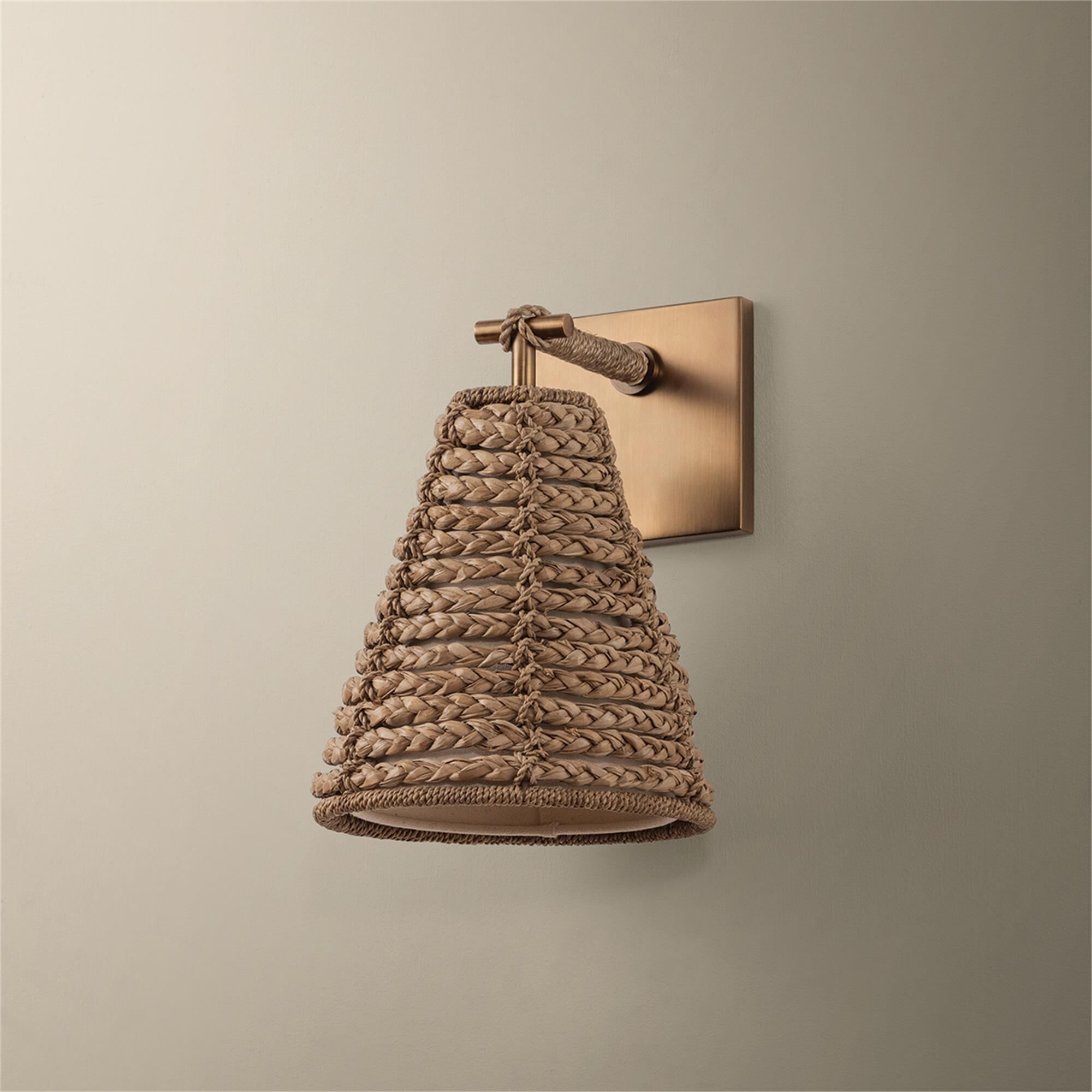 Shown in Patina Brass finish and Abaca shade