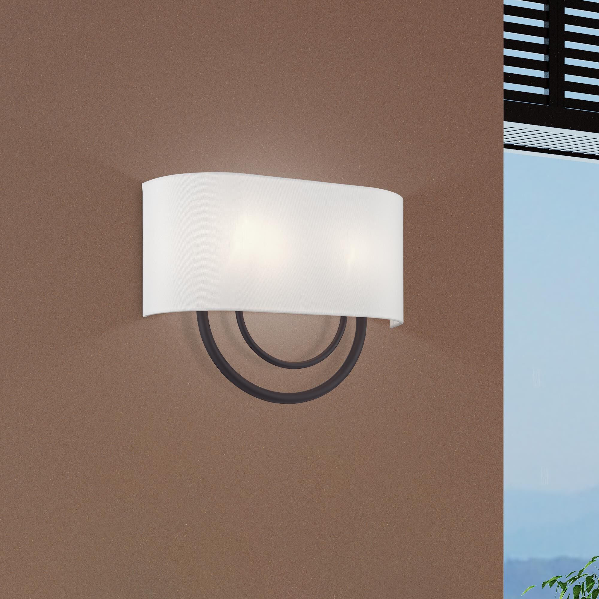 Shown in Bronze finish and Hand Crafted Off-White Fabric Hardback with White Fabric Inside shade