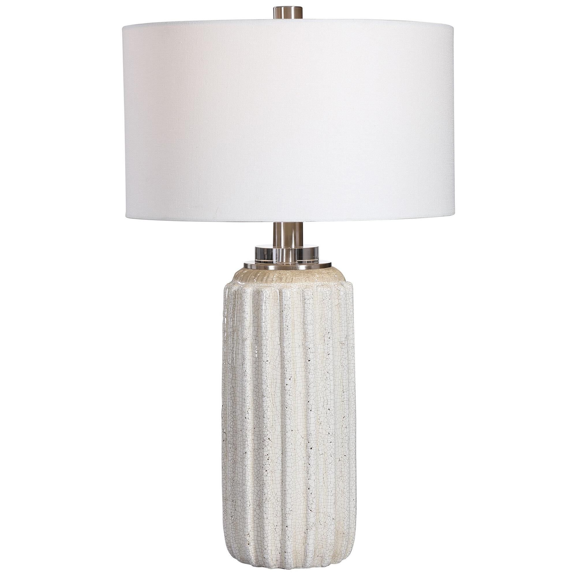 Shown in A Nod To Old World Style, This Ceramic Table Lamp Features A Distressed Cream And Beige Crackle Glaz finish and Round Hardback Drum shade