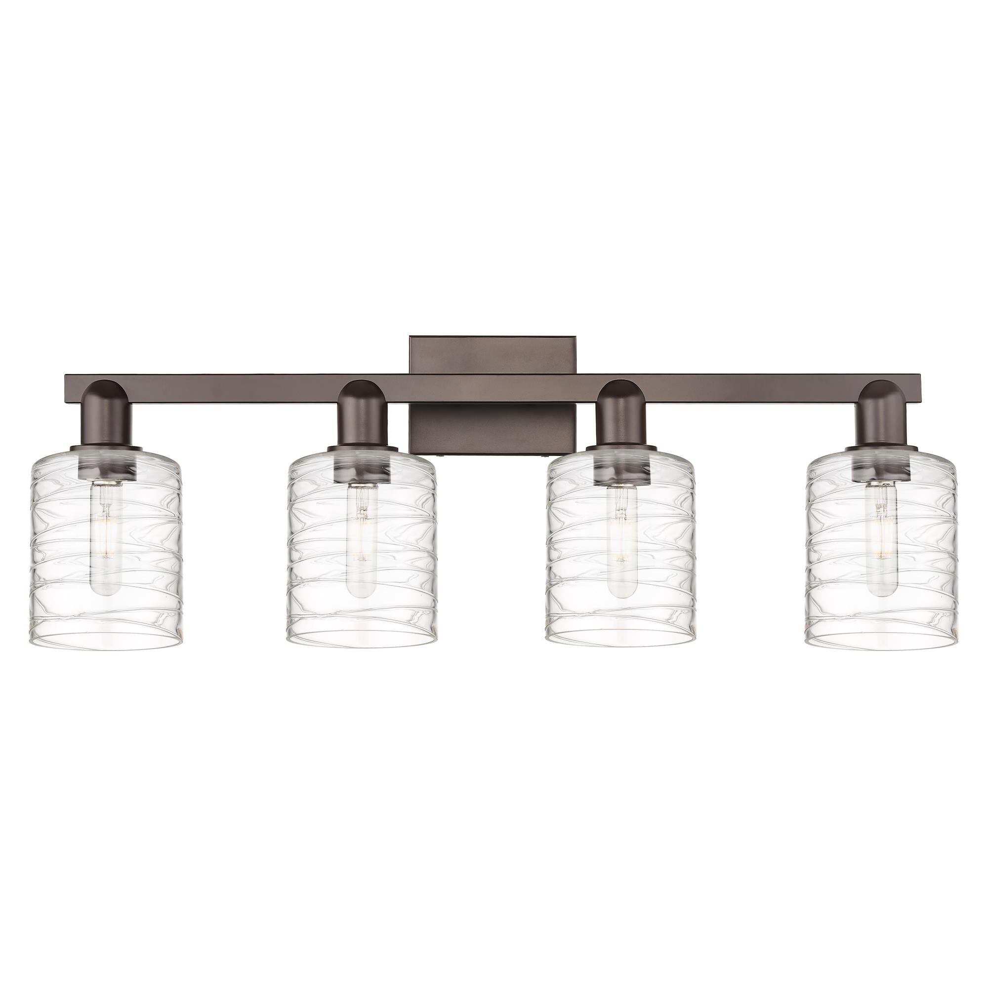 Shown in Oil Rubbed Bronze finish and Deco Swirl glass