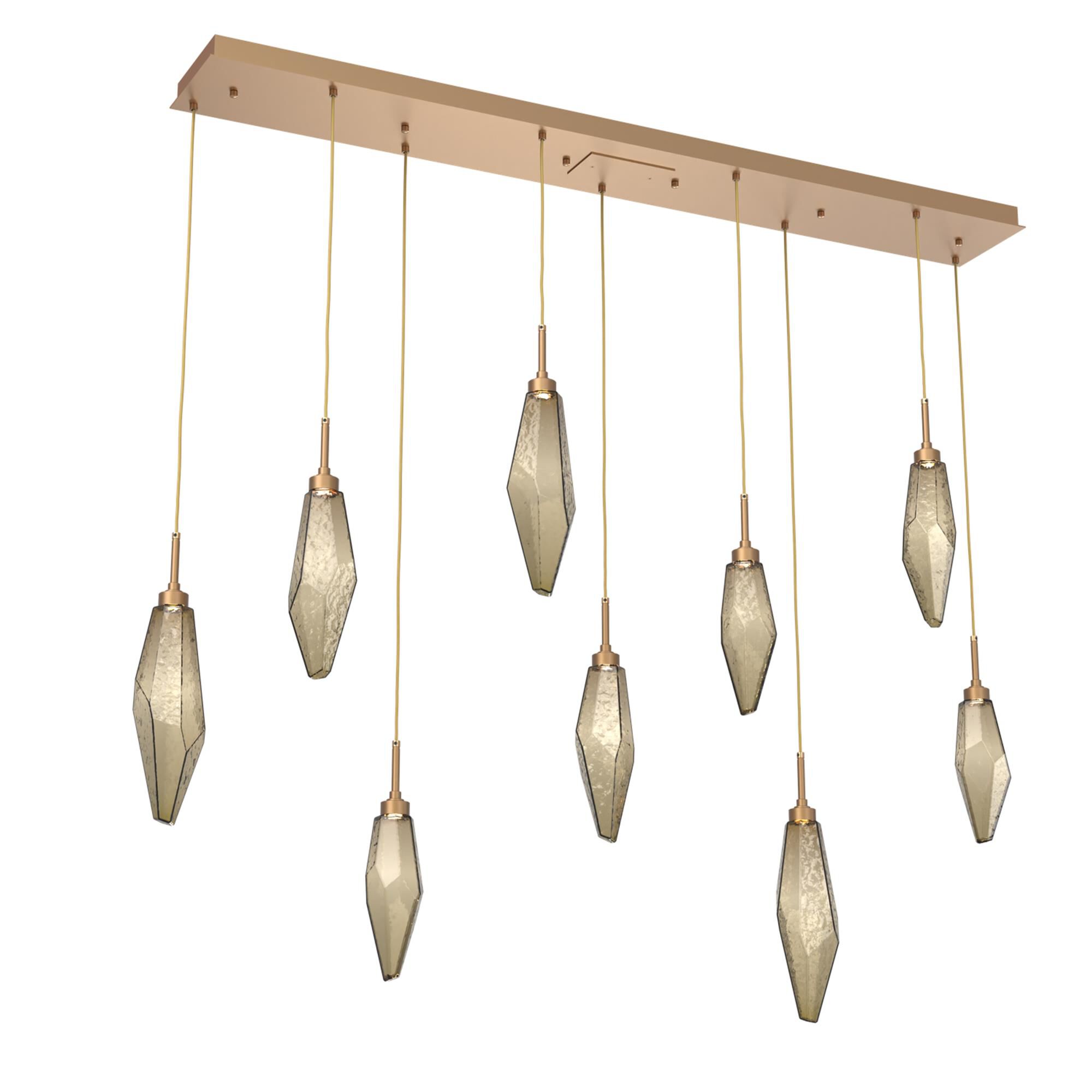 Shown in Novel Brass finish and Chilled Blown And Bronze glass