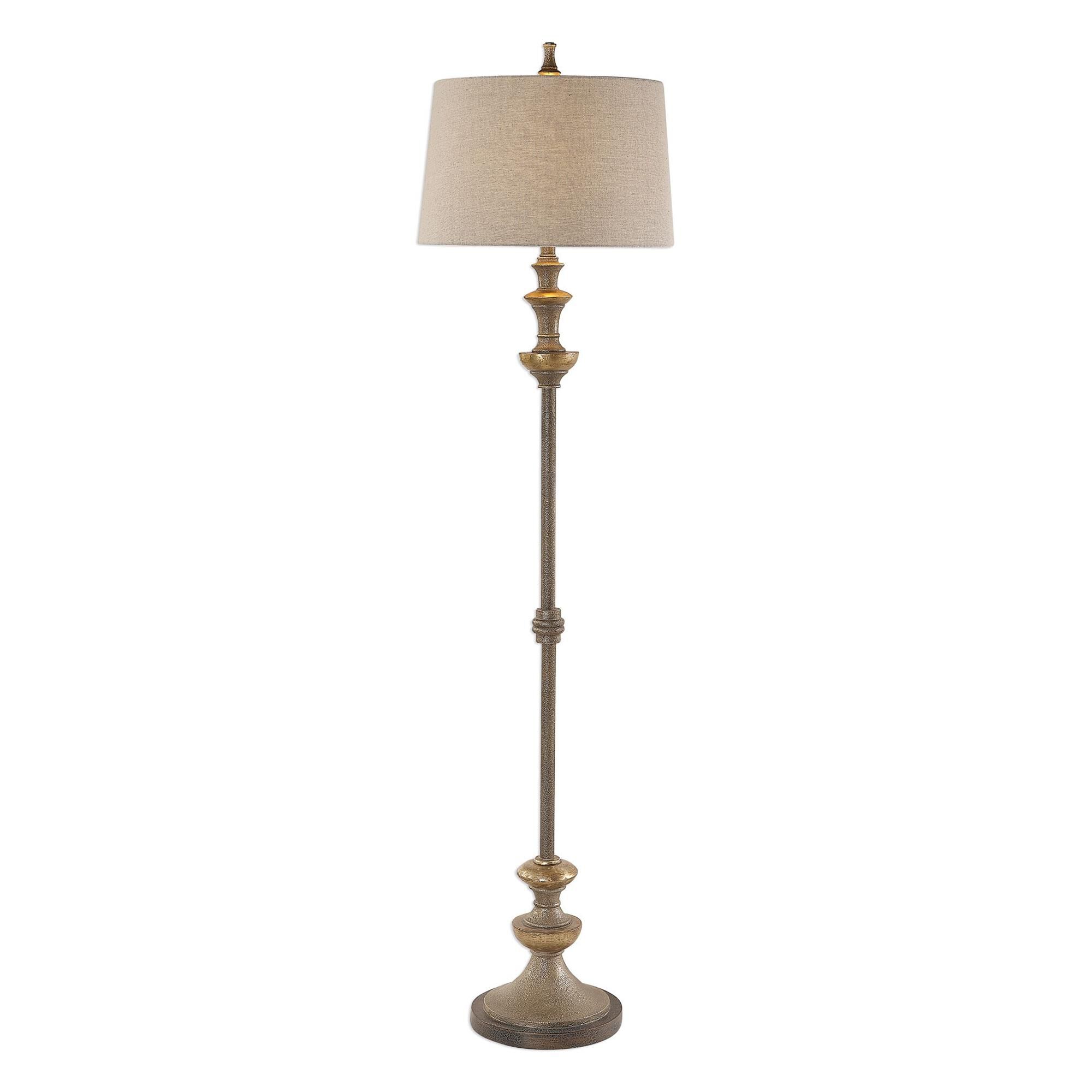 Shown in This Floor Lamp Features Heavily Burnished Textured Silver Details, Paired With Antiqued Silver Cham finish and Tapered Round Hardback shade