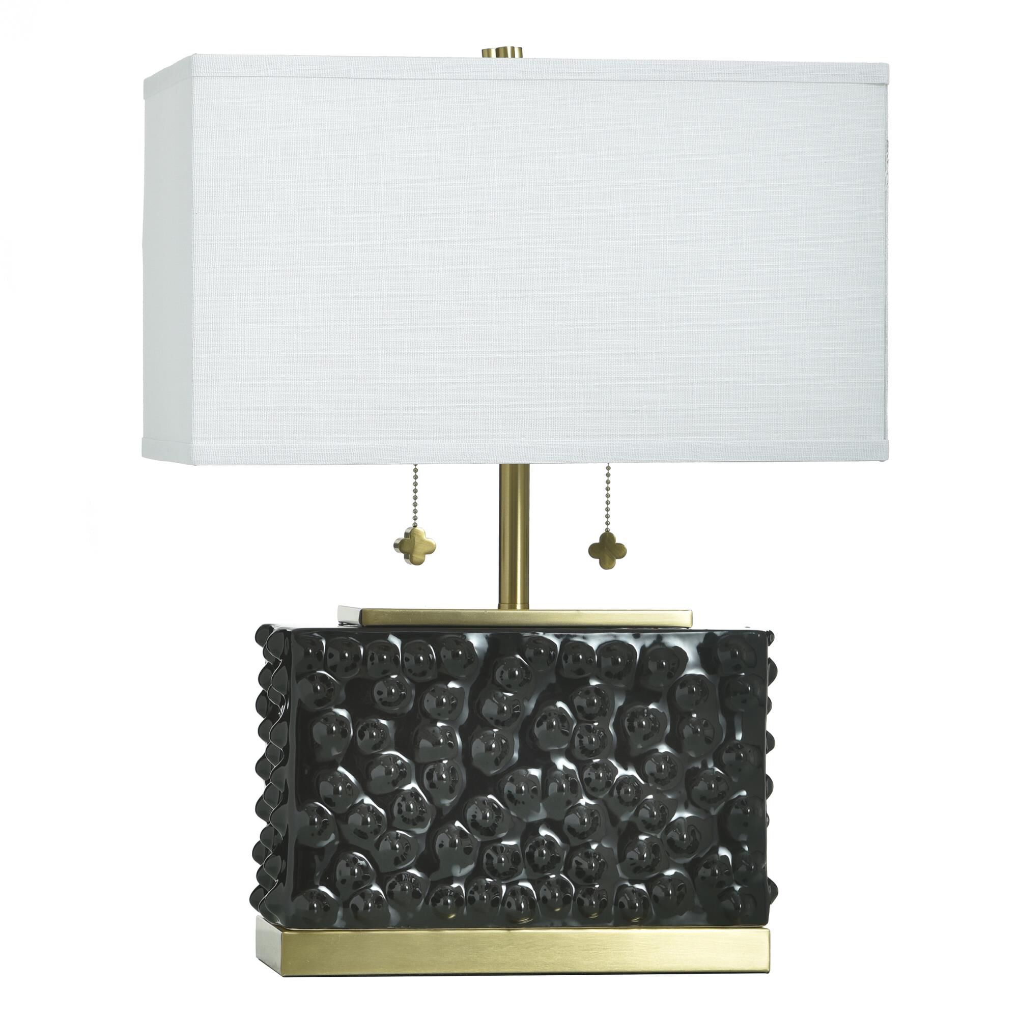 Shown in Polished Brass and Glossy Black finish and Off-White shade