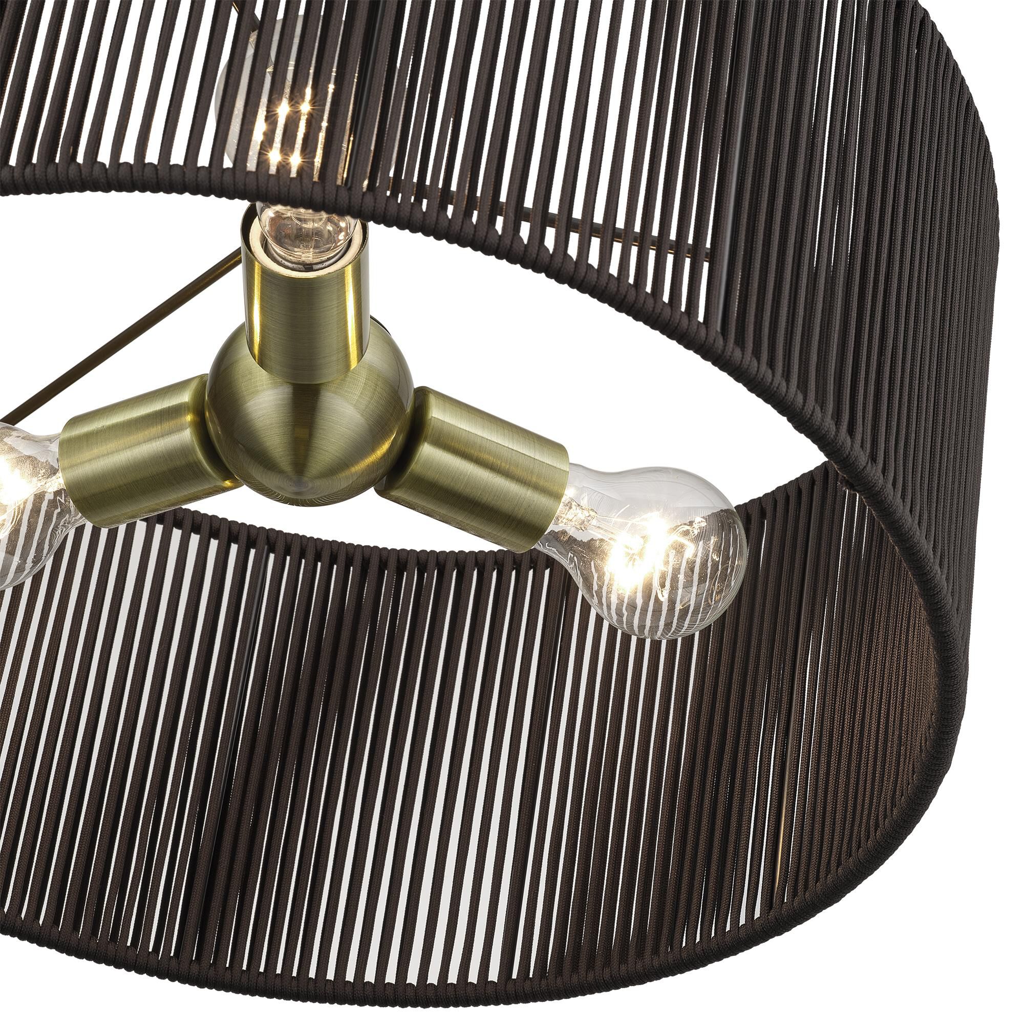 Shown in Antique Brass finish and Hand-Woven Dark Chocolate Color Polyester Rope shade