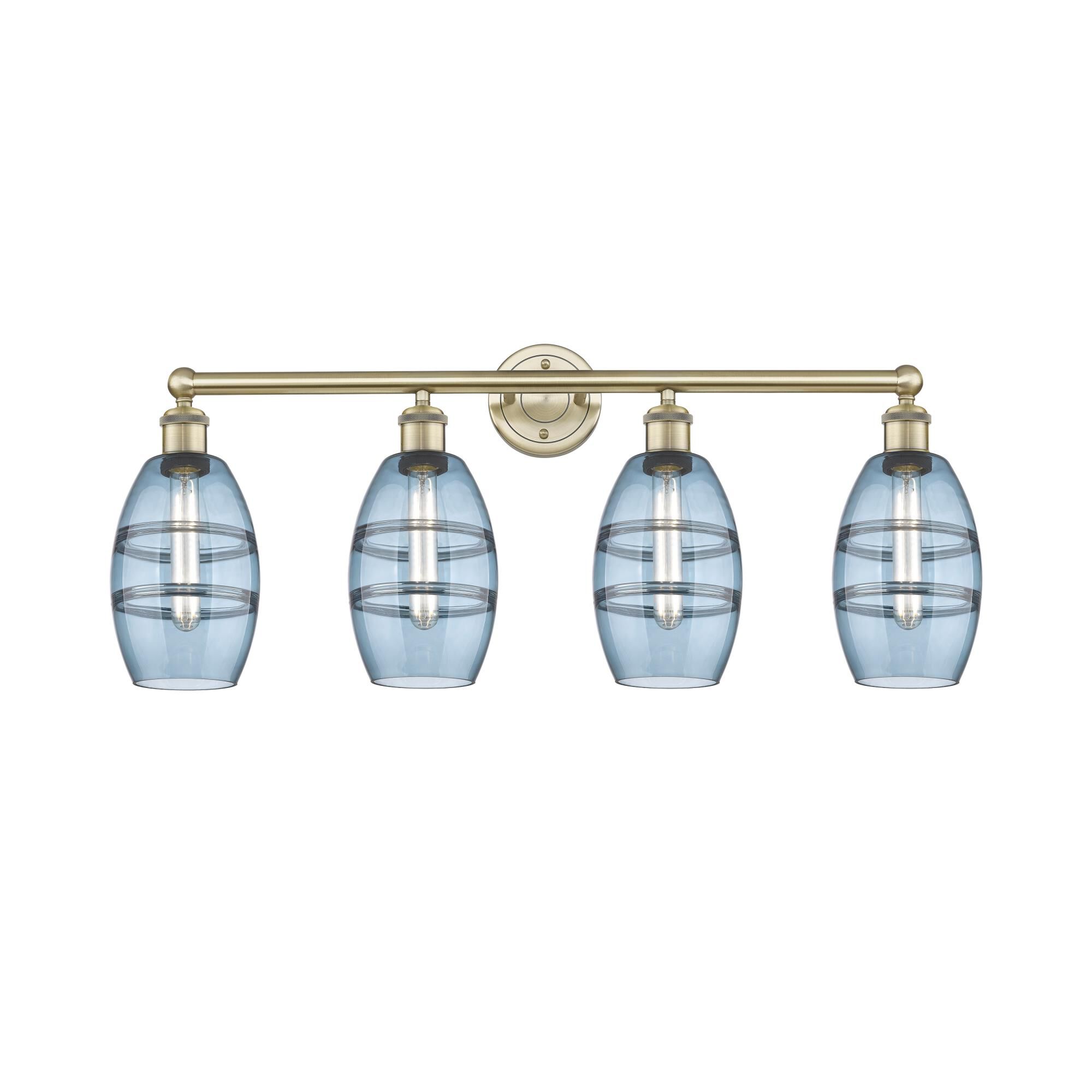Shown in Antique Brass finish and Princess Blue glass