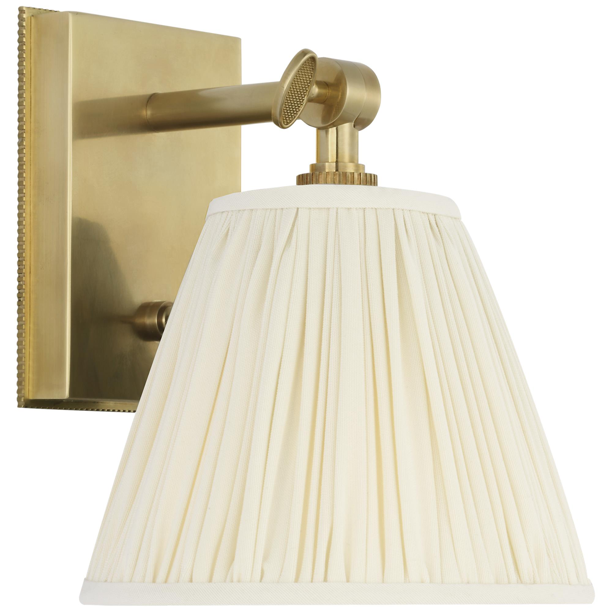 Shown in Soft Brass finish and Silk Pleated shade