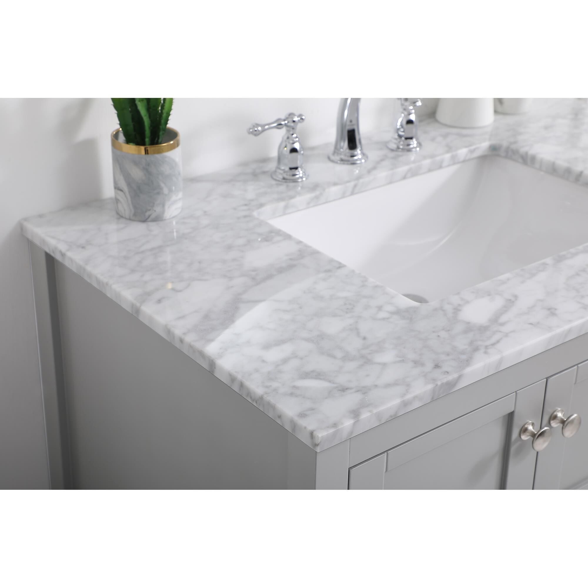 Shown in Gray And Brushed Nickel With Carrara White Marble finish