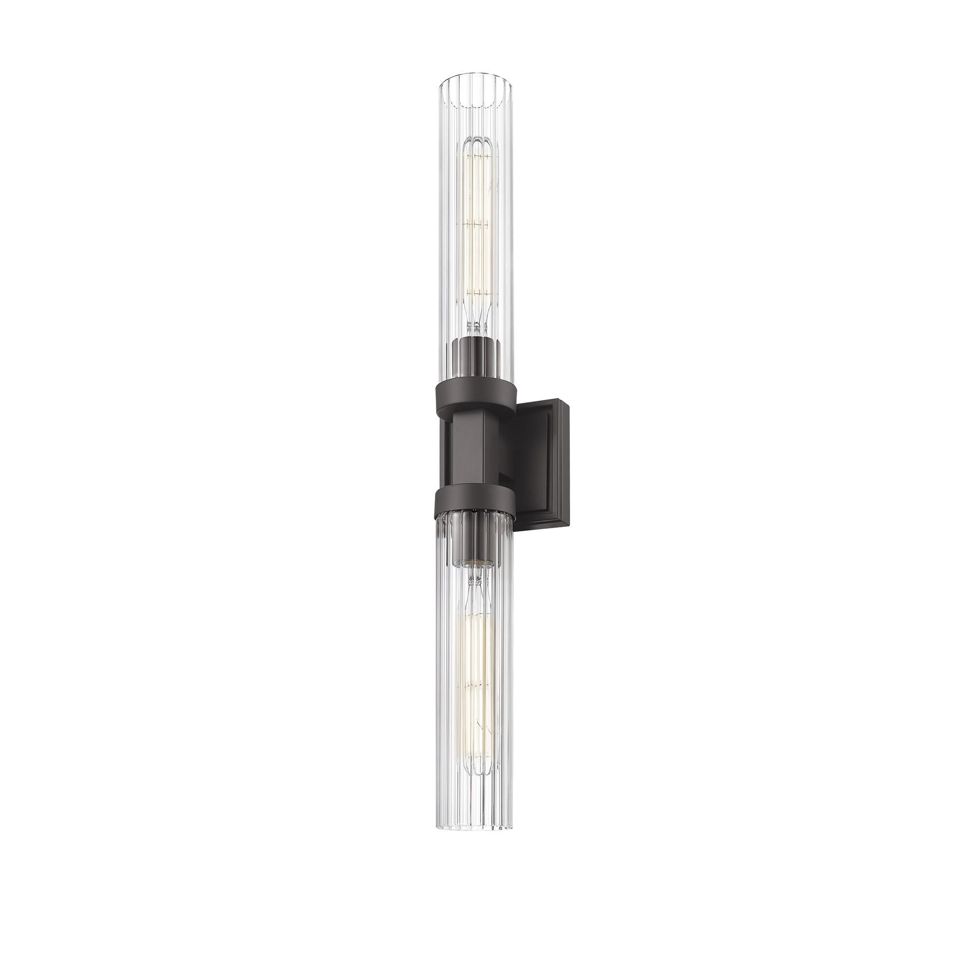 Shown in Bronze finish and Clear Ribbed glass and Clear Ribbed shade
