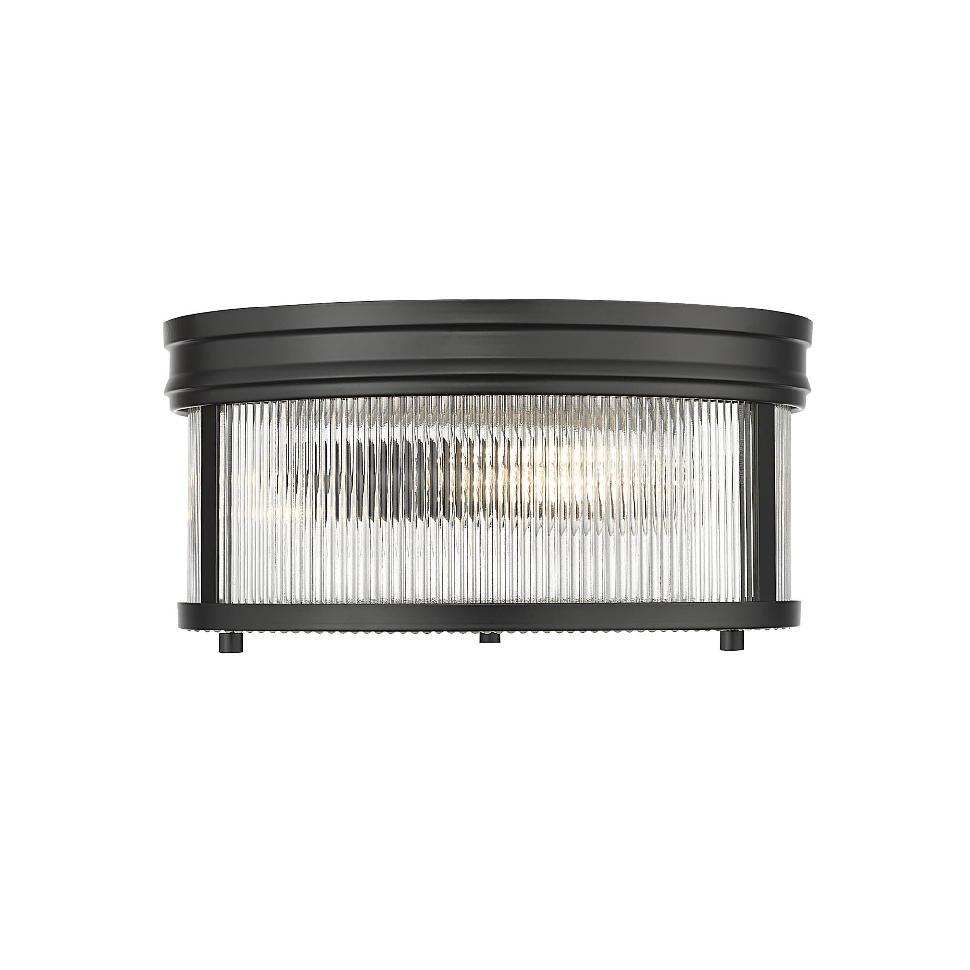 Shown in Matte Black finish and Clear Ribbed glass and Clear Ribbed shade