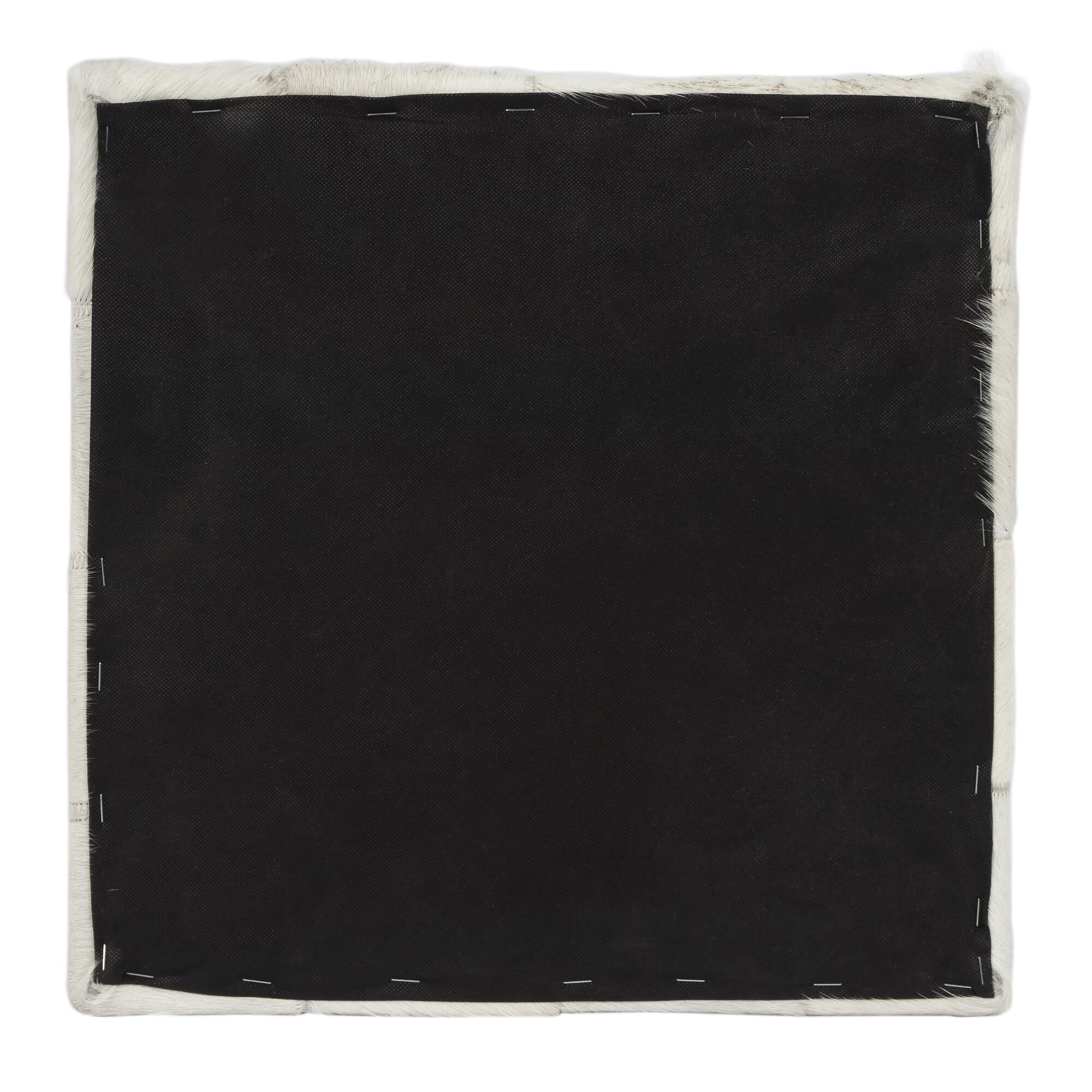 Shown in Hair on Hide finish