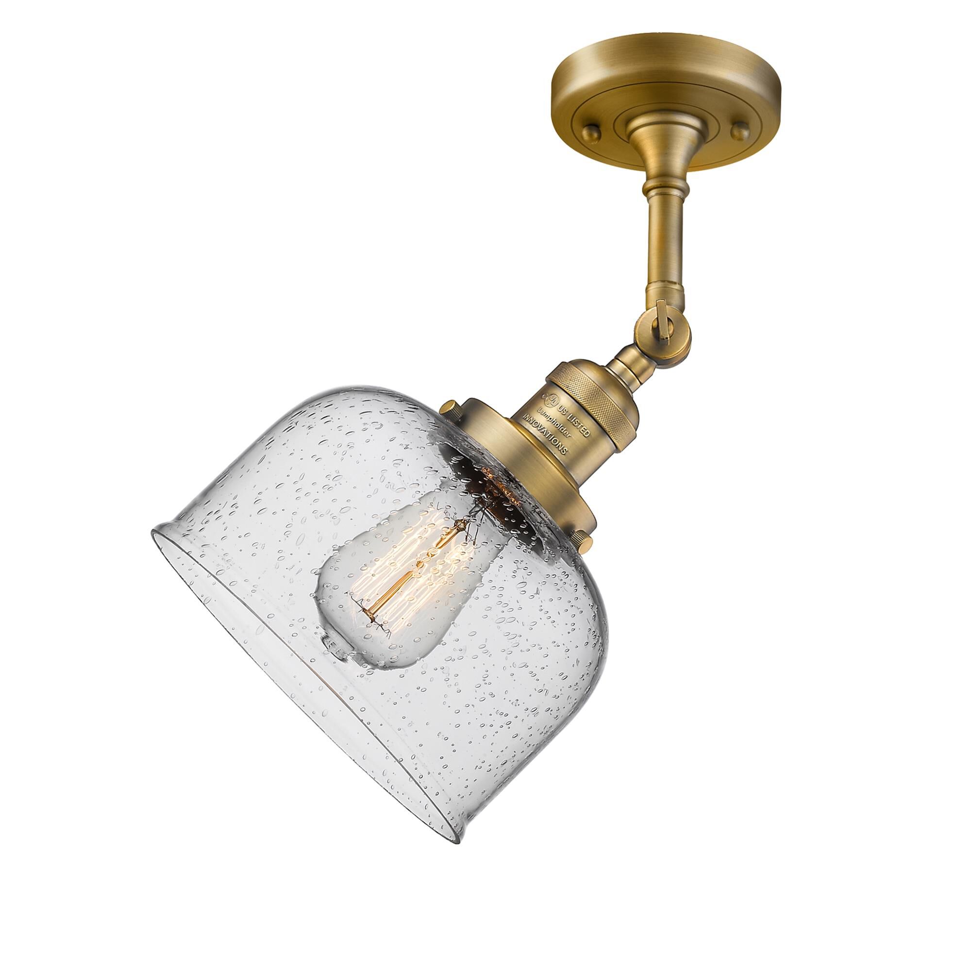 Shown in Brushed Brass finish and Seedy glass