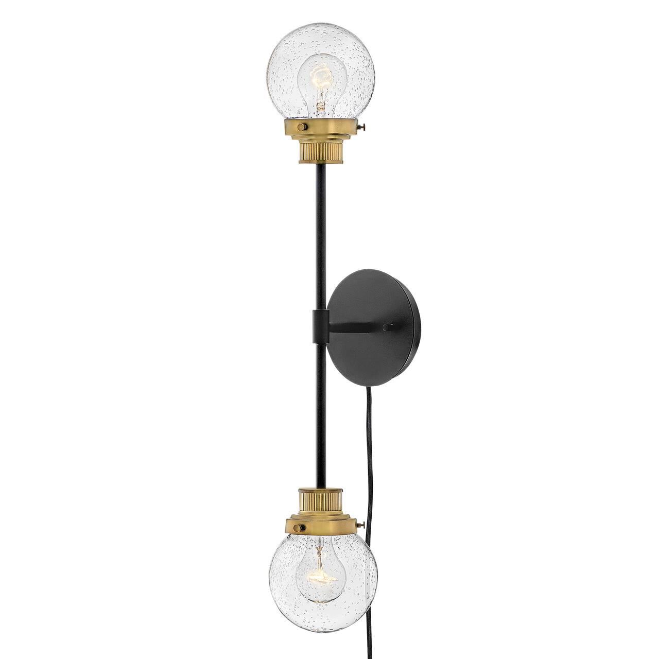 Shown in Black finish and Clear Seedy glass and Heritage Brass accent